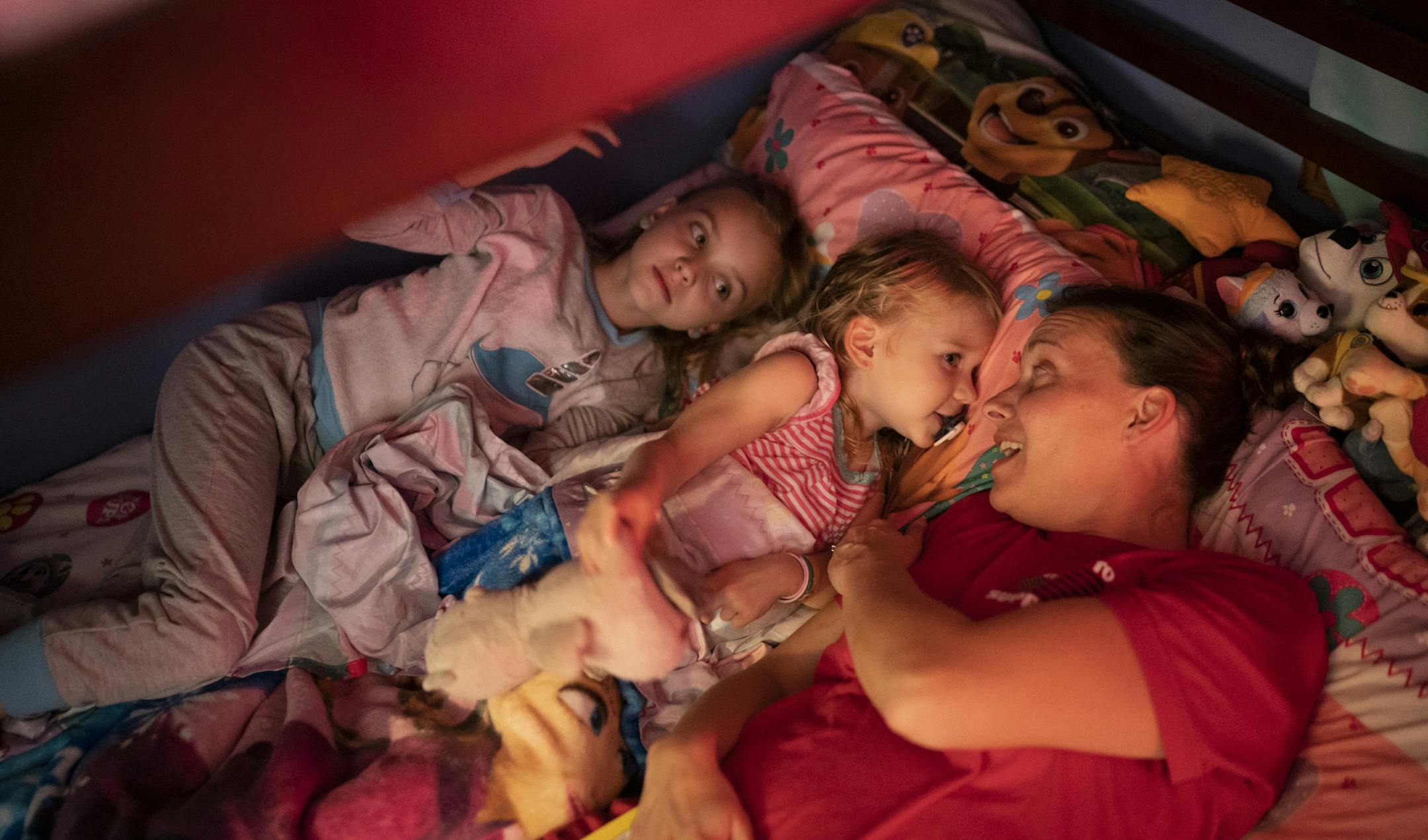 Jen Chafee snuggled with her daughters Madison, 8, and Ally, 3, on Sept. 18, knowing she will soon be deployed to the Middle East.