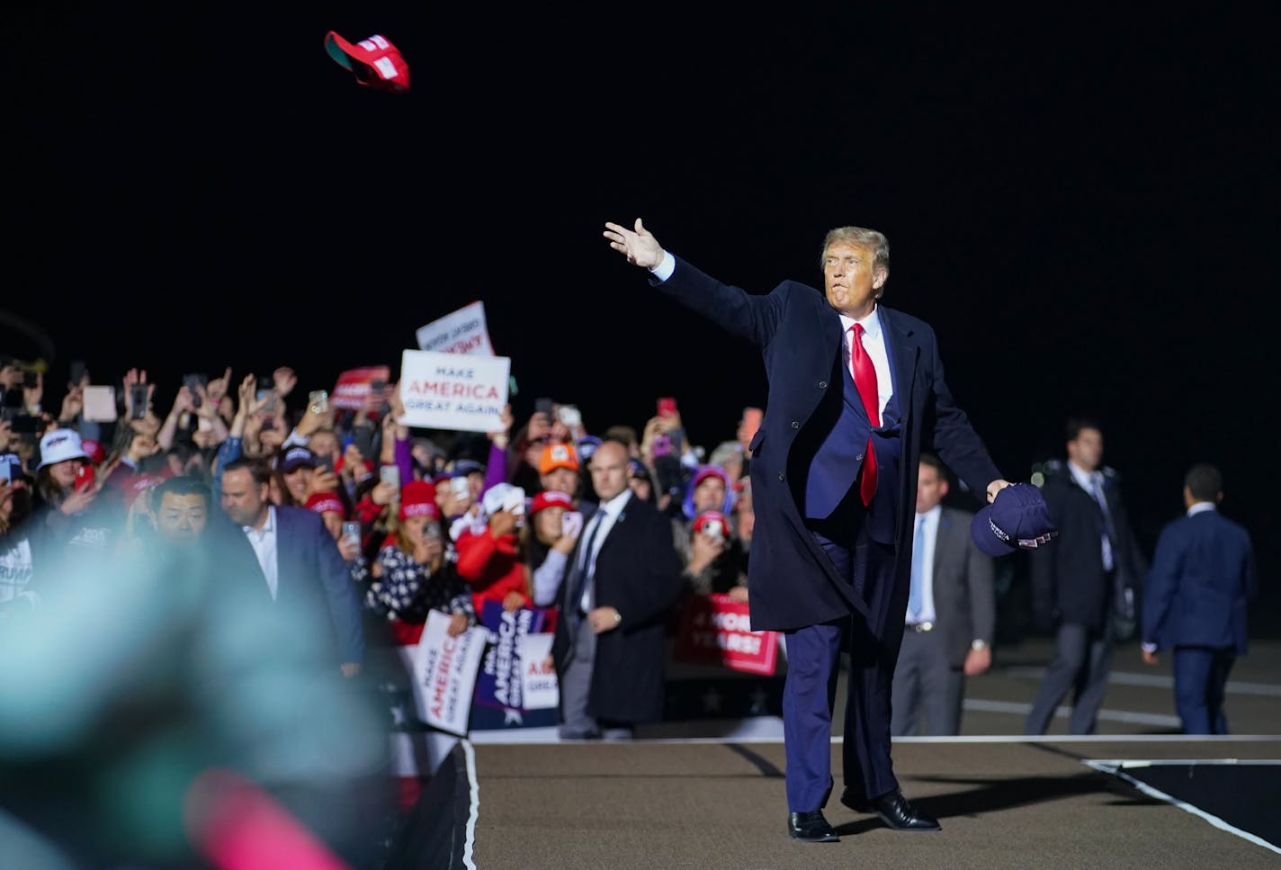 President Donald Trump spoke to a crowd of about 3,000 people at the Duluth airport on Wednesday after a fundraiser in Shorewood.