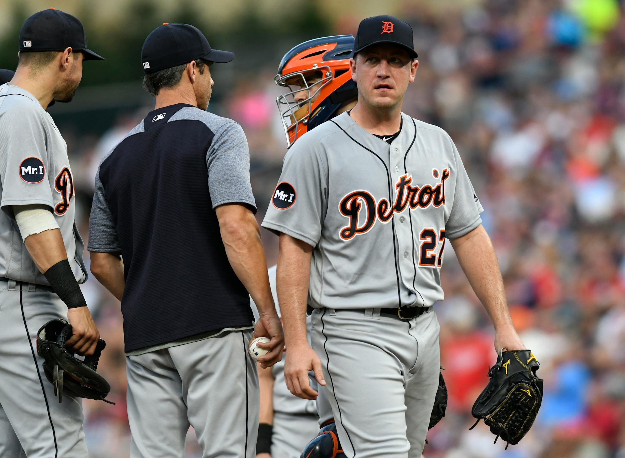 Detroit Tigers pitcher Jordan Zimmermann, right, leaves the mound after being pulled during the fourth inning of the team's baseball game against the Minnesota Twins on Saturday, July 22, 2017, in Minneapolis. (AP Photo/Tom Olmscheid)