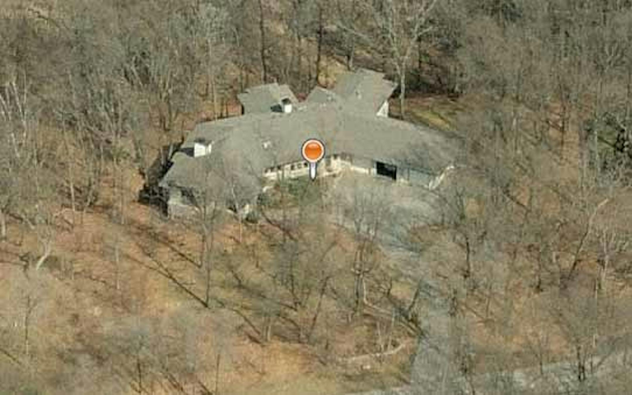 The Hoods, who bought this North Oaks home at 4 N. Mallard Road in 2006 for $865,000 in cash, defrauded the government out of $483,000.