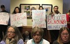 Faiza Mahamud &#xef; faiza.mahamud@startribune.com
Citizens held signs backing Lake Calhoun name change at Wednesday&#xed;s Minneapolis Park Board com