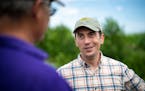 Democratic congressional candidate Dan Feehan toured the Thormodson family farm in Madelia. Owner John Thormodson talked about the unique challenges o