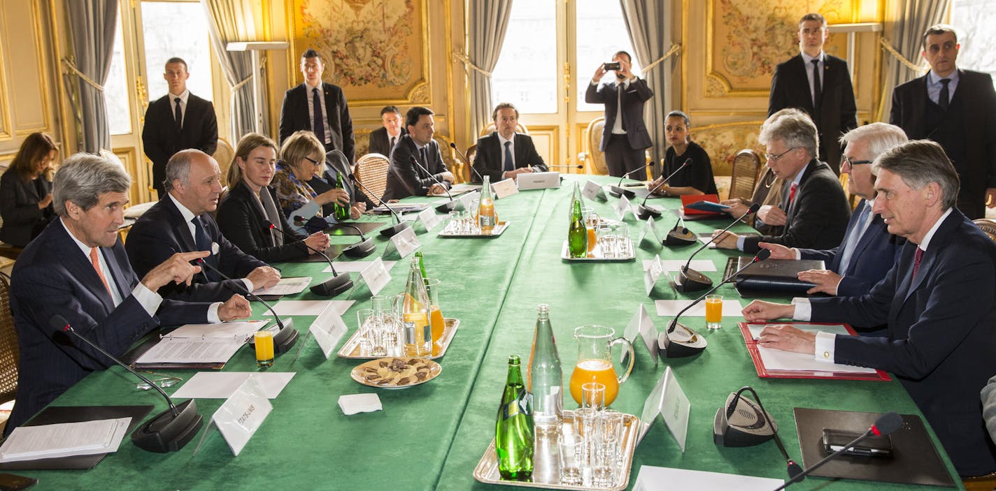 Secretary of State John Kerry, left, meets with French Foreign Minister Laurent Fabius, second left, British Foreign Minister Philip Hammond, right, and German Foreign Minister Frank-Walter Steinmeier, second right, on Saturday, March 7, 2015, in Paris. Kerry is meeting with the foreign ministers of France, Germany, and Britain to brief them on the status of nuclear negotiations with Iran. (AP Photo/Evan Vucci)