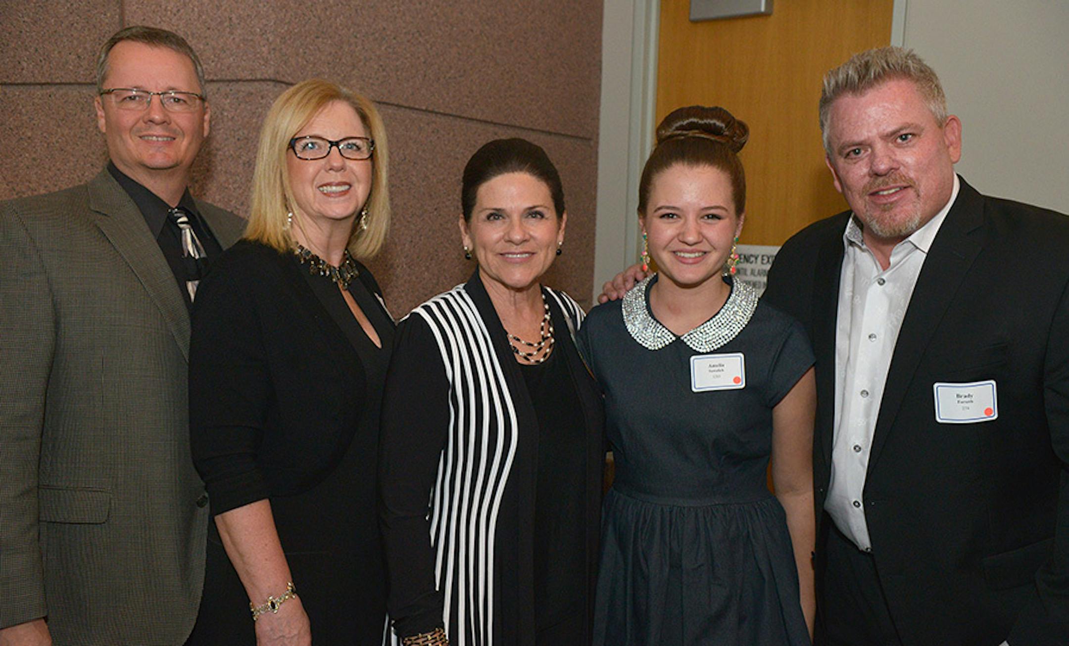 From left, Greg and Teri Austin, Starkey Hearing Foundation's Tani Austin, Amelia Sawalich, Starkey Hearing Foundation executive director, Brady Forseth.