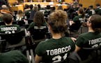Supporters wearing green shirts after the city council amended Tobacco sales in Edina from a minimum age of 18 to 21. ] CARLOS GONZALEZ &#xef; cgonzal