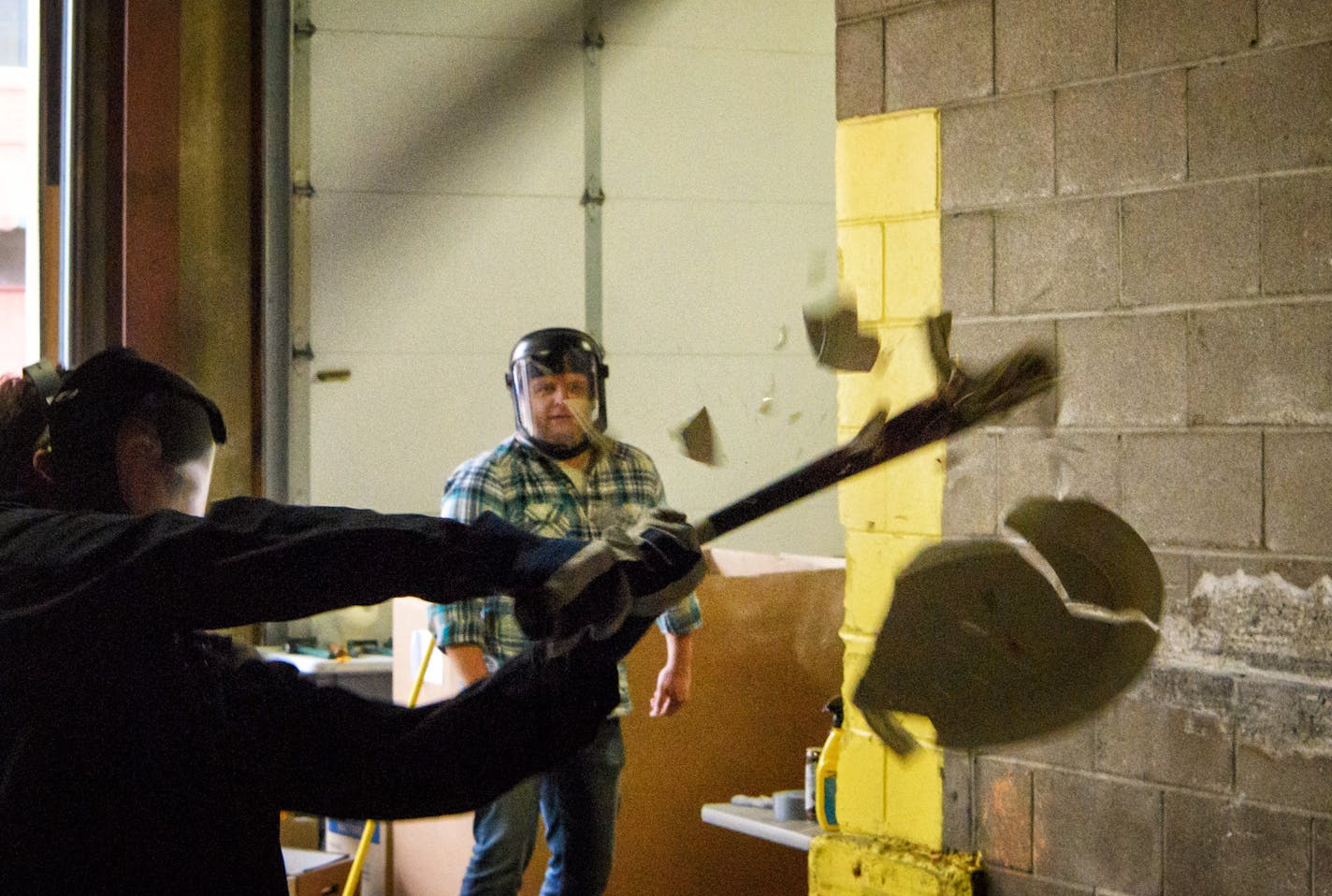 Adam Bjerke pitched plates and platters to Matt Cummings during Give to the Max Day. ] GLEN STUBBE * gstubbe@startribune.com Thursday, November 17, 2016 Spare Key partnered with The Break Room and held a Smash to the Max fundraiser for the 8th annual Give to the Max Day. People paid $20 to smash and destroy objects for 5 minutes with sledgehammers and baseball bats. Spare Key helps critically ill or seriously injured children by providing a housing grant for their parents so they can stay in the