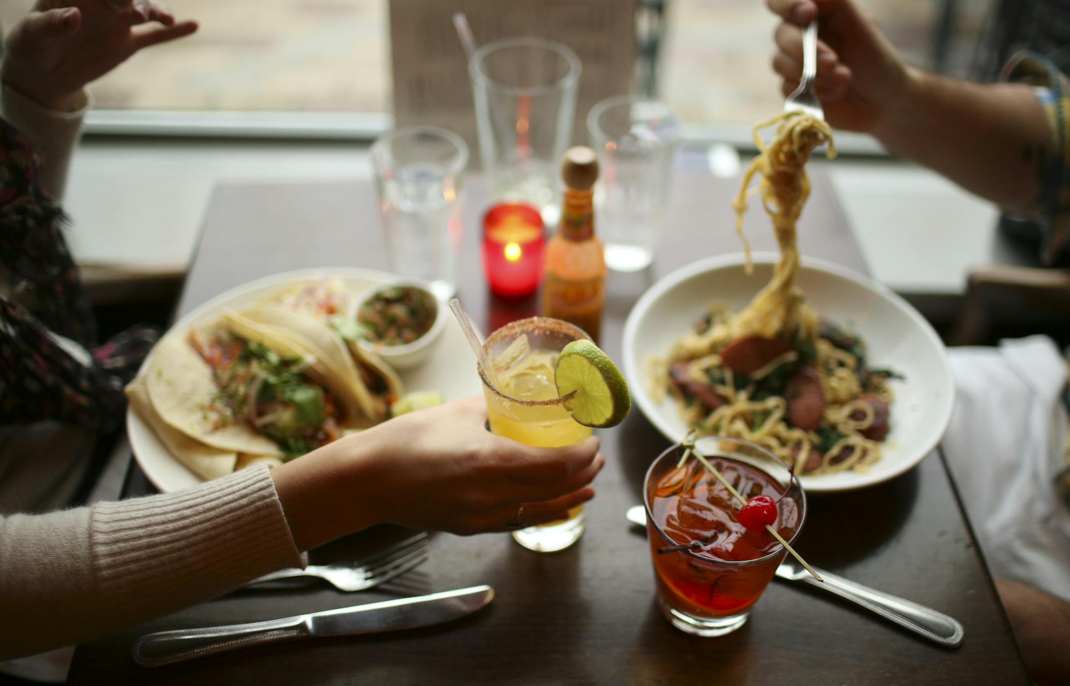 Minneapolis officials are tackling a 30-year-old rule that requires most of the city's bars to make 60 percent of their revenues from food. It's known around City Hall as the "60-40" rule. Keeping up with those ratios is particularly tough for businesses in Uptown, which has a thriving nightlife scene. Two city council members hope a change to 50-50 will ease the burden. Pat's Tap at 36th St. and Nicollet Ave. S. in Minnneapolis, Minn. does a robust business in food. Two patrons enjoyed food wit