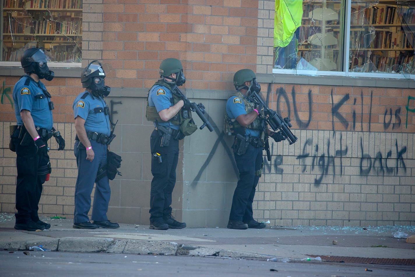 St. Paul police fired tear gas on protesters along University Avenue in May during protests following the death of George Floyd while in Minneapolis police custody.