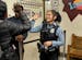In this 2019 photo, Minneapolis police officer and school resource officer Drea Leal greeted a passing student as she did her rounds in the hallways o