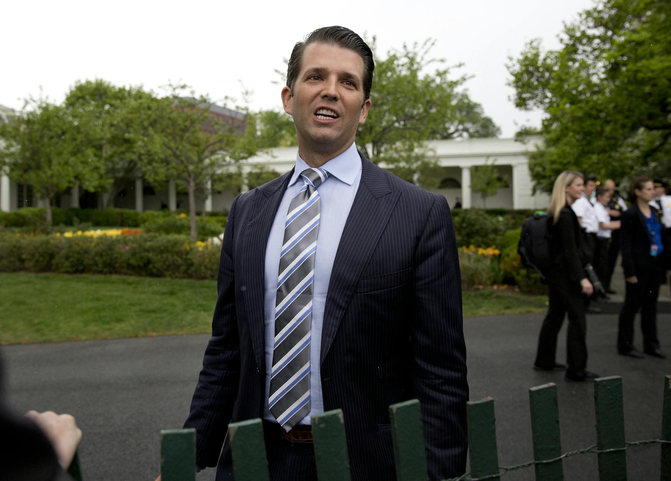 FILE - In this April 17, 2017, file photo, Donald Trump Jr., the son of President Donald Trump, speaks to media during the annual White House Easter Egg Roll on the South Lawn of the White House in Washington. At the heart of Donald Trump Jr.’s unusual campaign-season meeting with a Russian lawyer was an obscure sanctions law that has infuriated the Kremlin. The Magnitsky Act, passed by Congress in 2012, was a U.S. response to the dubious death of a different Russian lawyer named Sergei M