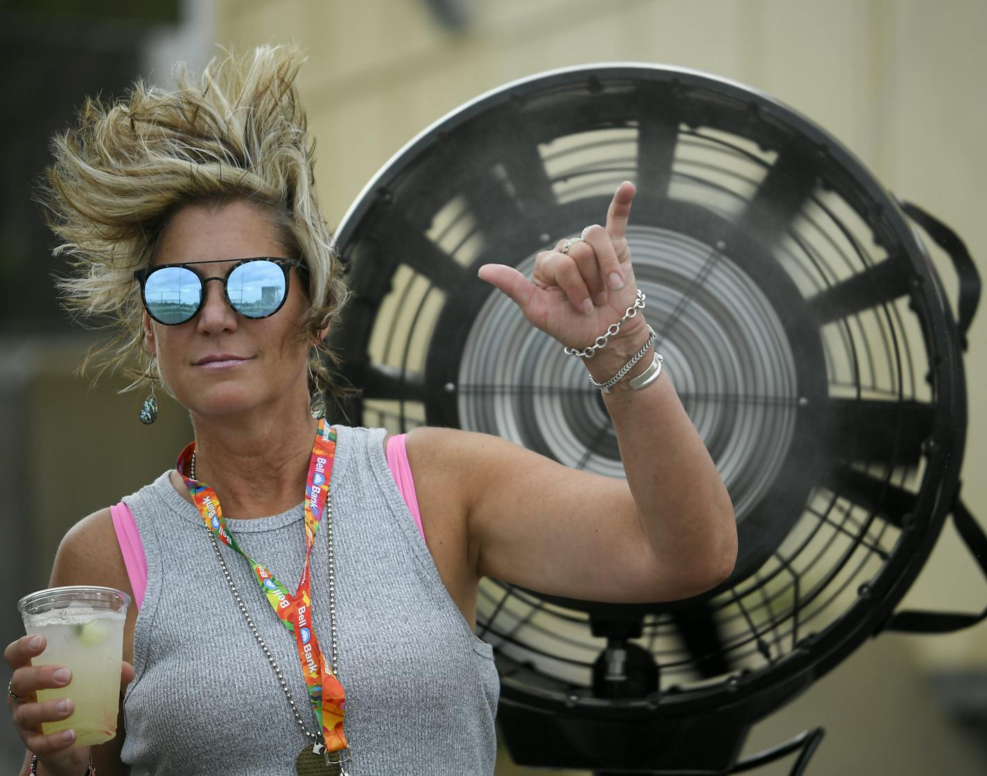 Suzie Dahl, of Lakeville, gestured to the camera as she stood by a mister fan at the Twin Cities Summer Jam Festival Friday. ] Aaron Lavinsky &#xa5; aaron.lavinsky@startribune.com The second day's of the Twin Cities Summer Jam Festival was held Friday, July 19, 2019 at Canterbury Park in Shakopee, Minn.