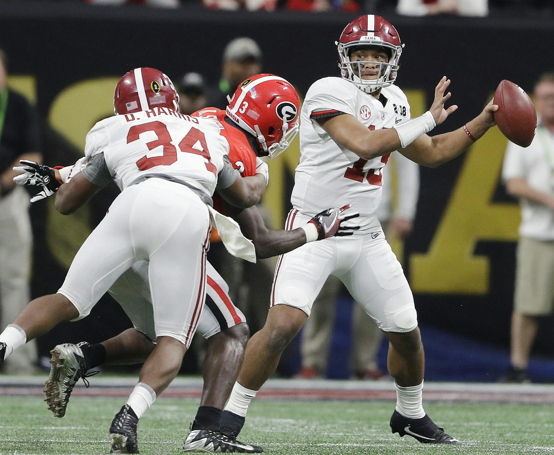 Alabama quarterback Tua Tagovailoa drops back to pass during the second half of the NCAA college football playoff championship game against Georgia Monday, Jan. 8, 2018, in Atlanta. (AP Photo/David J. Phillip)