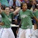 Minnesota Lynx's Maya Moore, Lindsay Whalen, Seimone Augustus and Rebekkah Brunson, from left, celebrate on the bench during the fourth quarter of a W