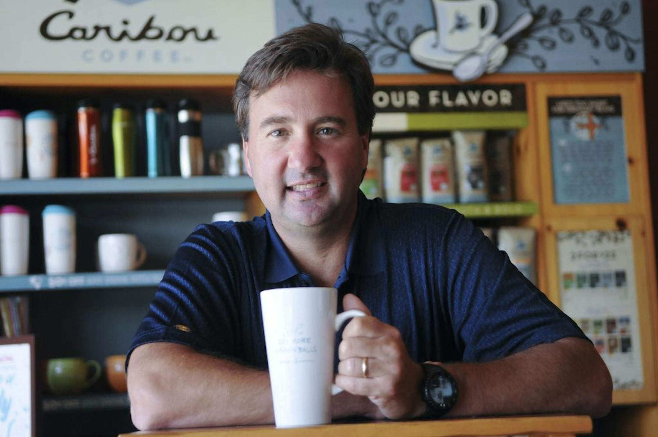 Michael Tattersfield CEO of Caribou Coffee has been leading the company on a path of rapid growth.He talked about the present and future during an interview on Wednesday, 7/6/2011 at Caribou Coffee Headquarters in Brooklyn Center, Minn.This portrait was made in a Caribou Coffee shop attached to the headquarters.