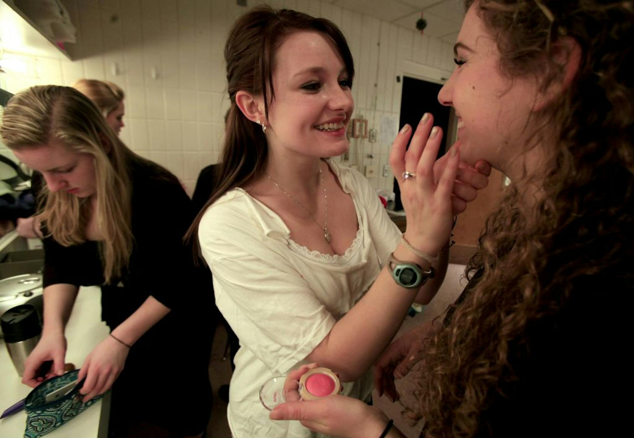 Actors get dressed for their rehersal at Visitation High School who are putting on a play at school in conjunction with Interact Center for the Arts, a theater company that helps disabled people perform. Mendota Heights, MN on January 30, 2013.