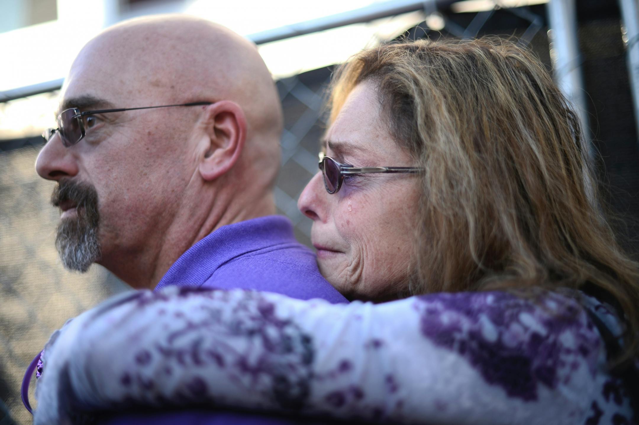 Linda Mack, of New Jersey, embraced Richard Bloom as she was overcome with emotion as "Cross" by Prince was performed Saturday during the block party outside First Ave. "For him (Prince), his music had a lot of spiritual and religious undertones, so when touched that, he touched us."