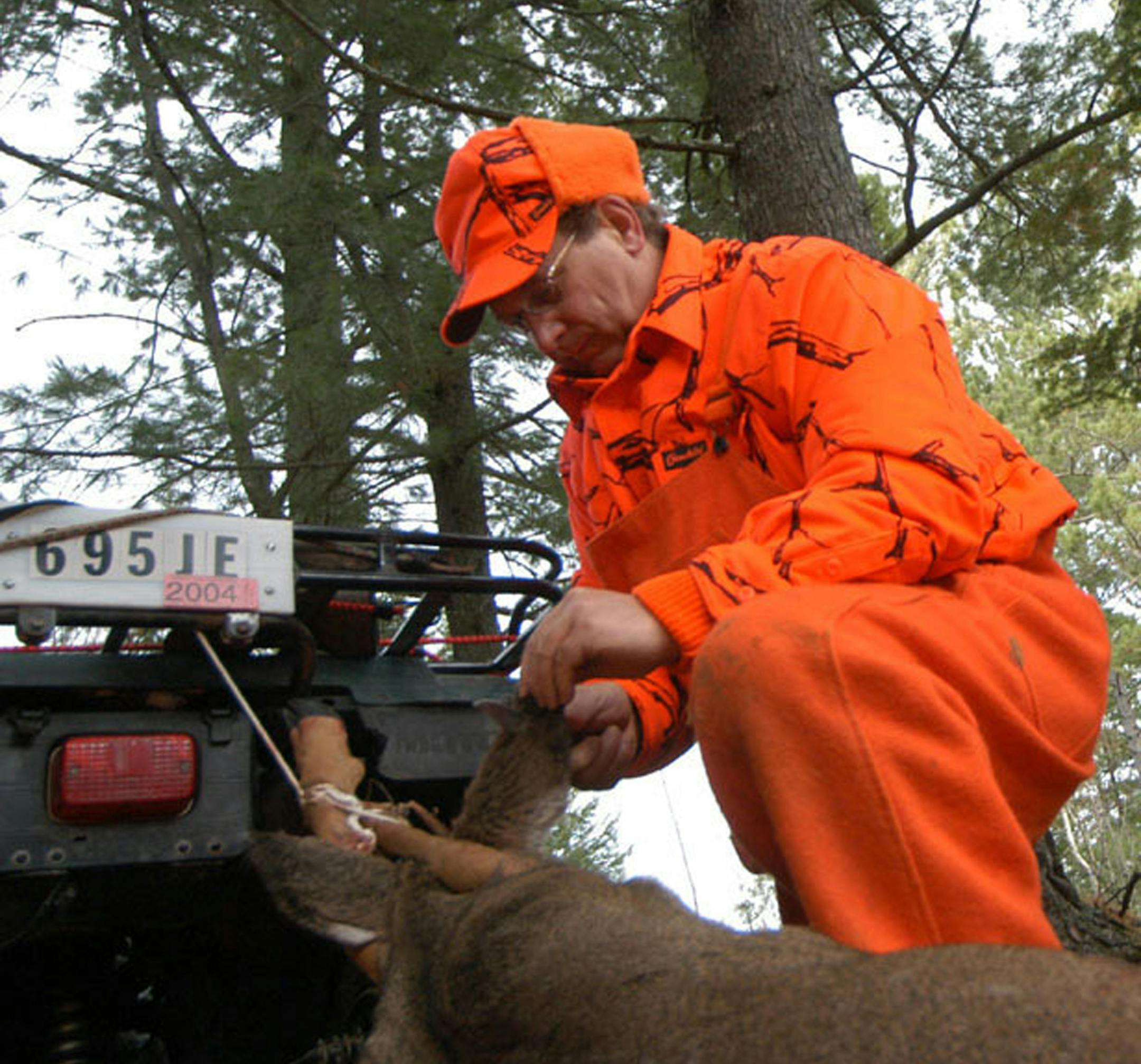 RELATIVES AS ROLE MODELS: Dick Anderson of Eveleth, Minn., has welcomed his nephews Trevor and Cole Anderson on deer hunts ever since they earned their hunter safety certificates. ORG XMIT: MIN2013112206351108