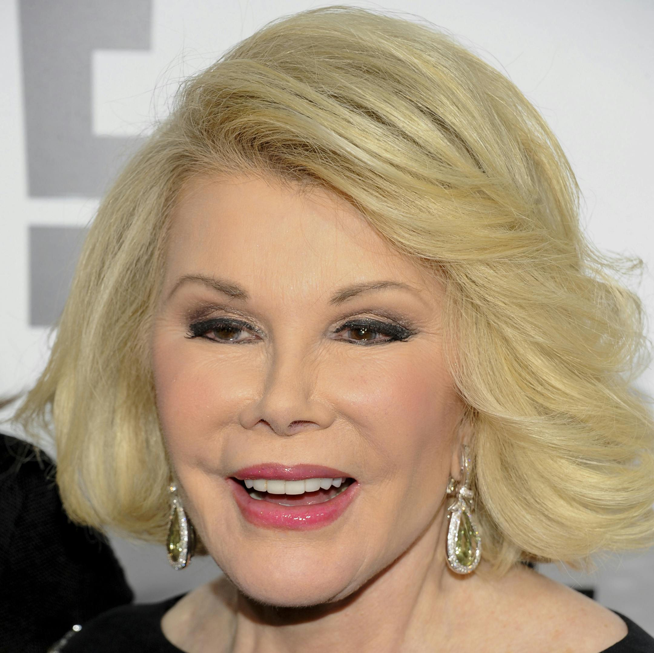 Joan Rivers from "Fashion Police" attends an E! Network upfront event at Gotham Hall on Monday, April 30, 2012 in New York. (AP Photo/Evan Agostini) ORG XMIT: NYEA114 ORG XMIT: MIN1301021047083646