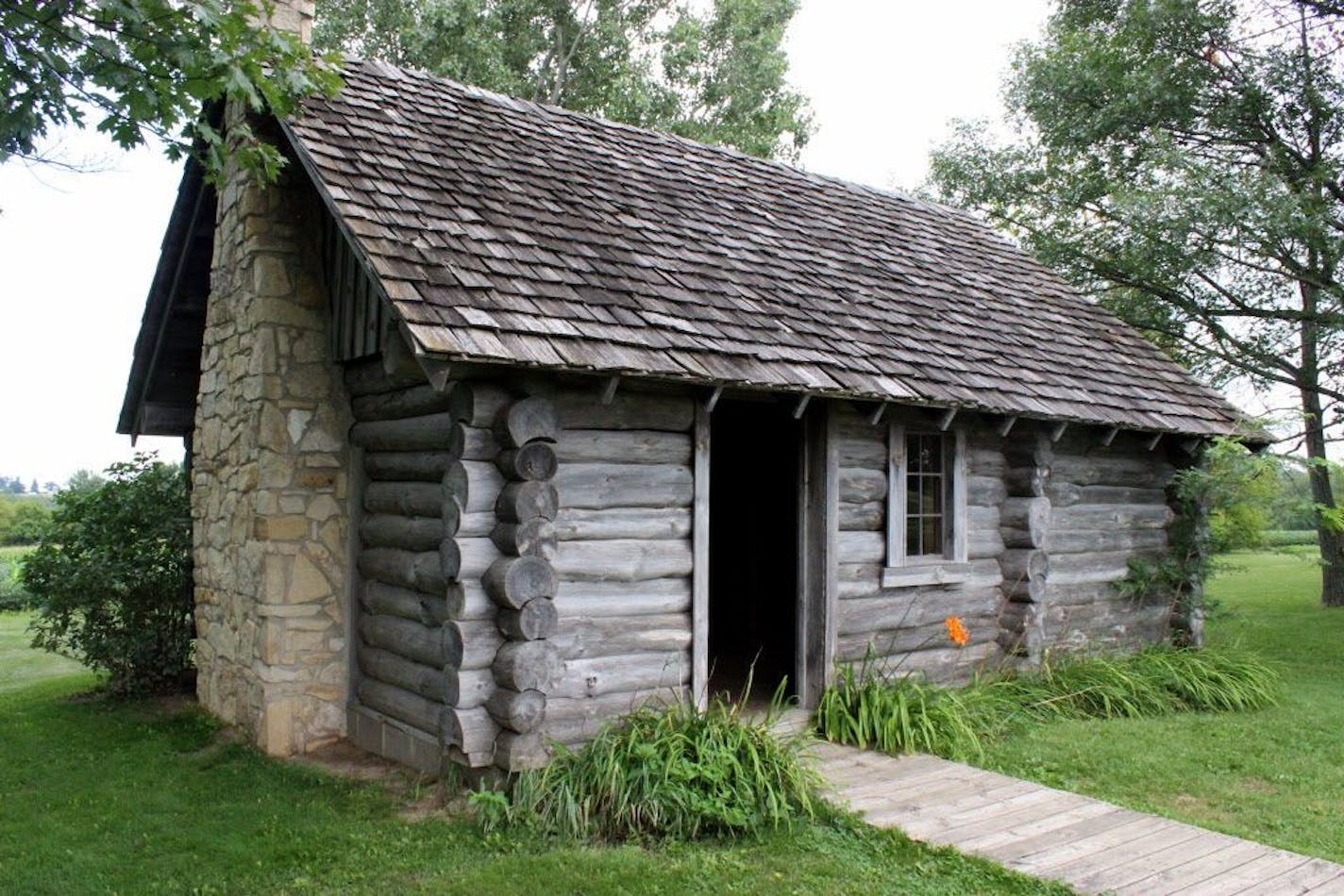 This replica of a settler's house marks the birthplace of Laura Ingalls Wilder in Pepin, Wis.