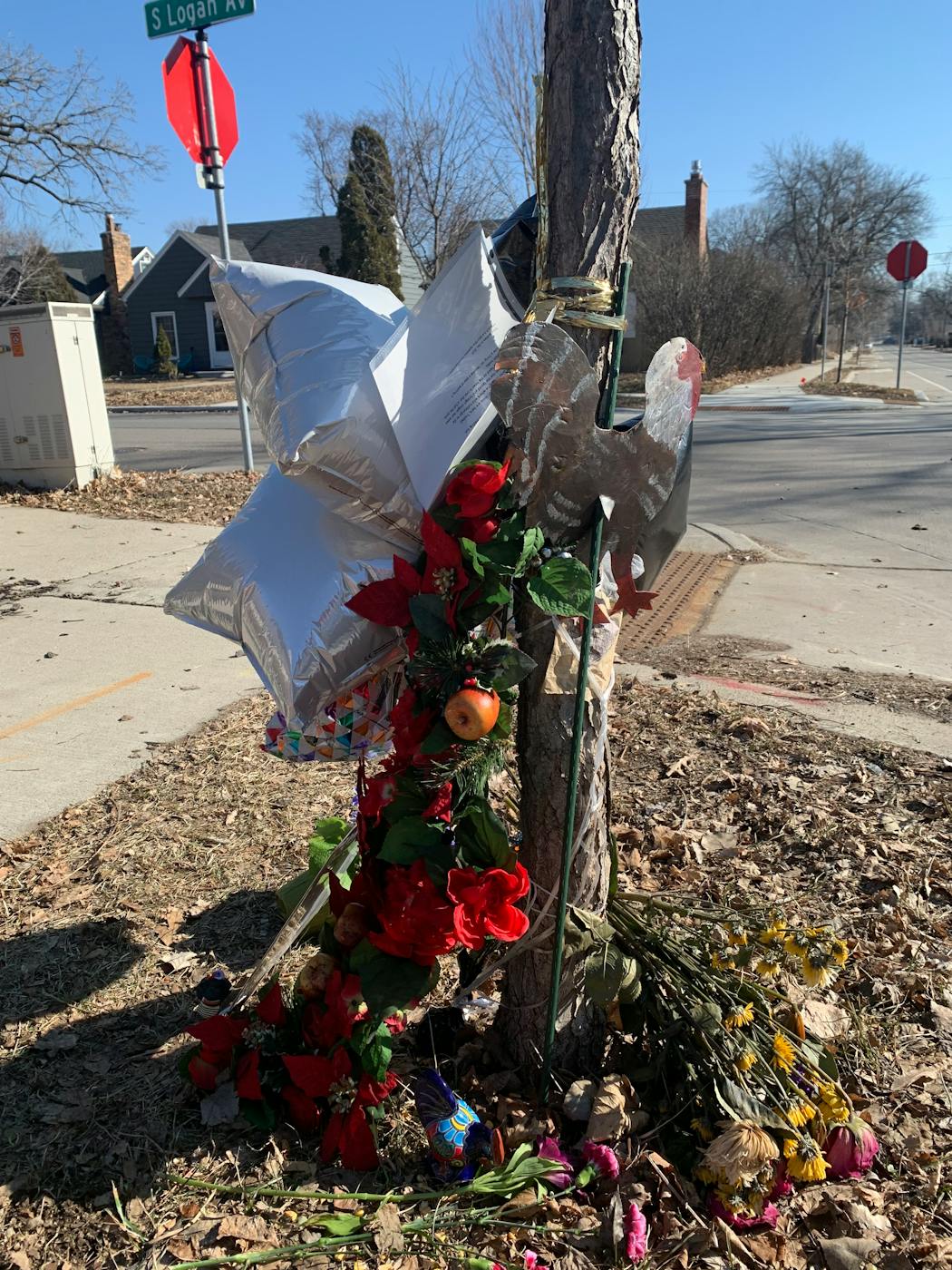 A memorial for a beloved neighborhood turkey at 54th St. and Logan Ave. in south Minneapolis included love notes and an original poem.