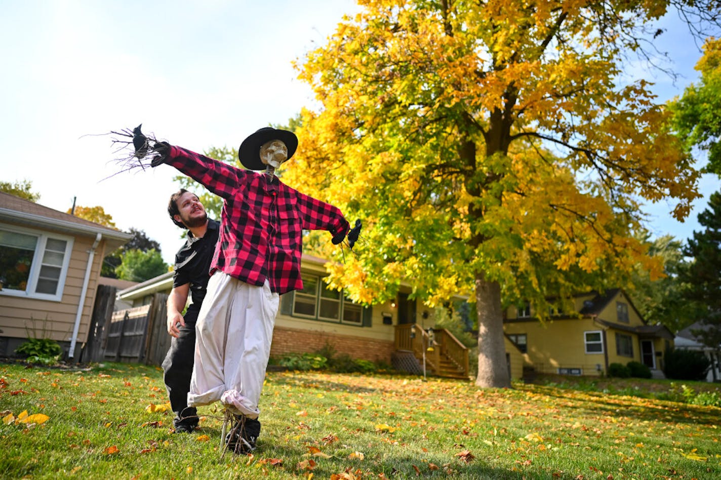 Andrew Tiegs of Robbinsdale worked on putting up his hand-made skeleton scarecrow in his front yard late last month. He's also got a hand-maid giant spider and wraith to put out for his favorite holiday of the year. "If just having a cool-looking house is all I can do, that's enough," he said.