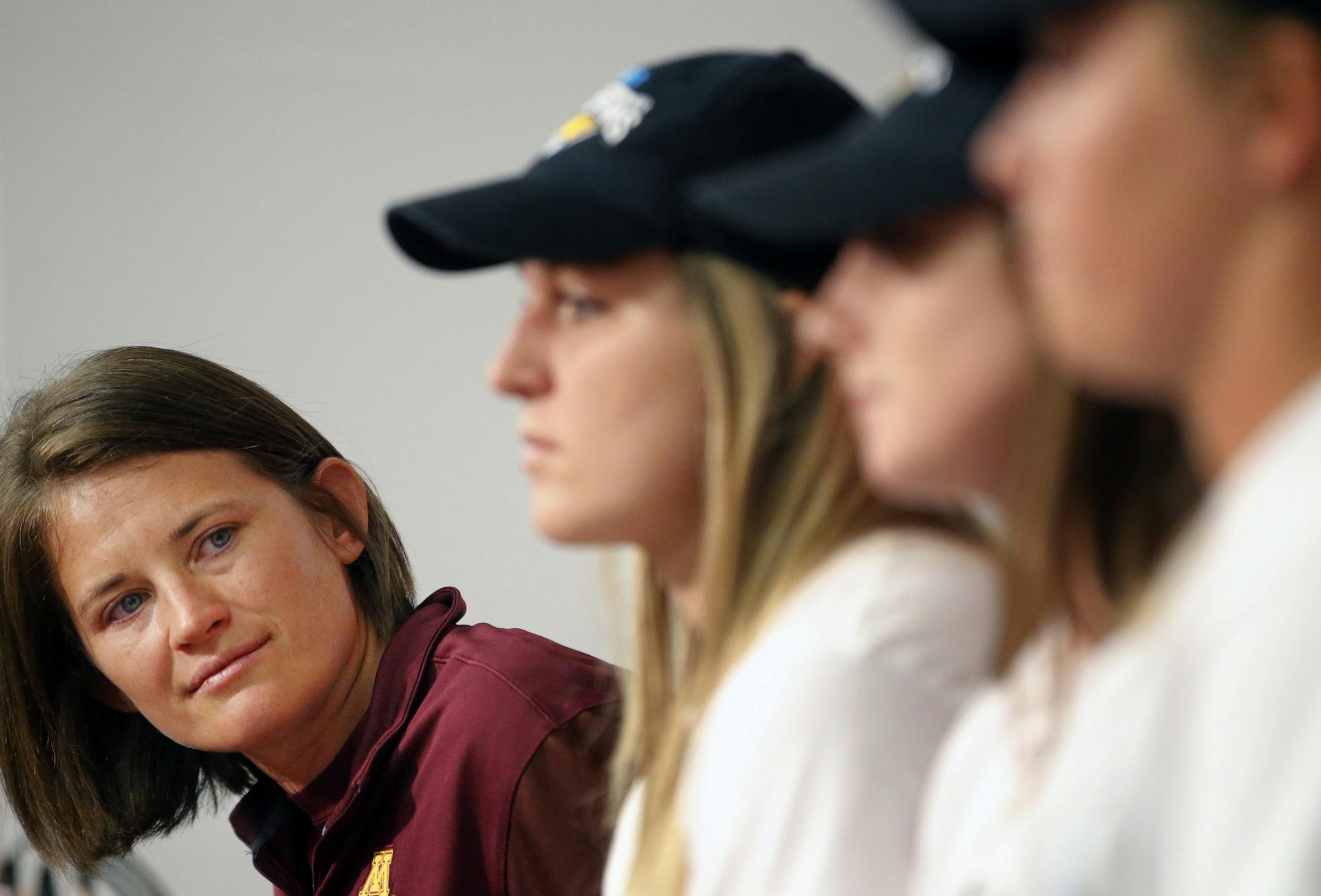 (From left) Gophers softball coach Jessica Allister and players Kendyl Lindaman, Maddie Houlihan, and Sydney Dwyer will use the team's seeding snub as motivation in the NCAA tournament.