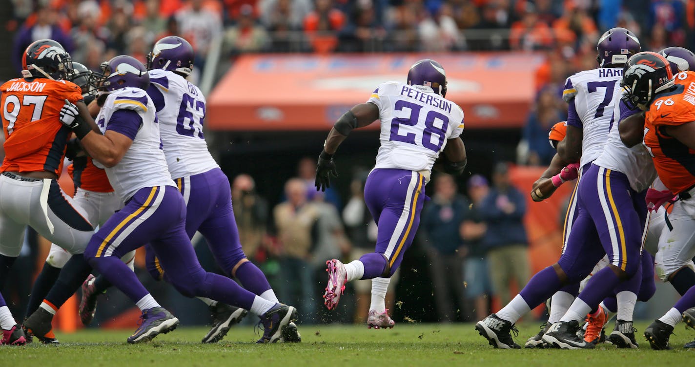 After a first half with 10 carries and 28 yards Adrian Peterson found a hole and broke free for a 48 yard TD run in the 4th quarter. ] Minnesota Vikings vs Denver Broncos, Sports Authority Field at Mile High Stadium. Brian.Peterson@startribune.com Denver, CO - 10/04/2015