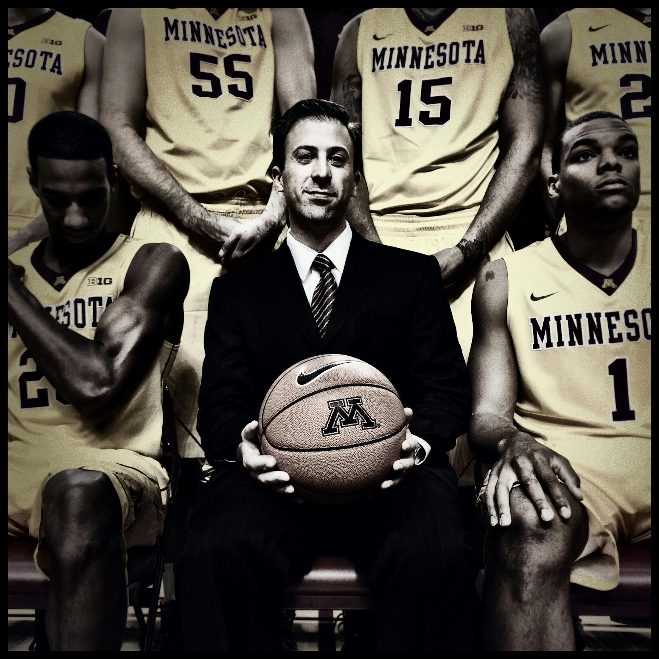 University of Minnesota head basketball coach Richard Pitino waited with his players to take a team photograph at Williams Arena. - iphone picture/edited with an app ] CARLOS GONZALEZ cgonzalez@startribune.com October 28, 2013, Minneapolis, Minn., Williams Arena, NCAA Basketball, University of Minnesota Gophers