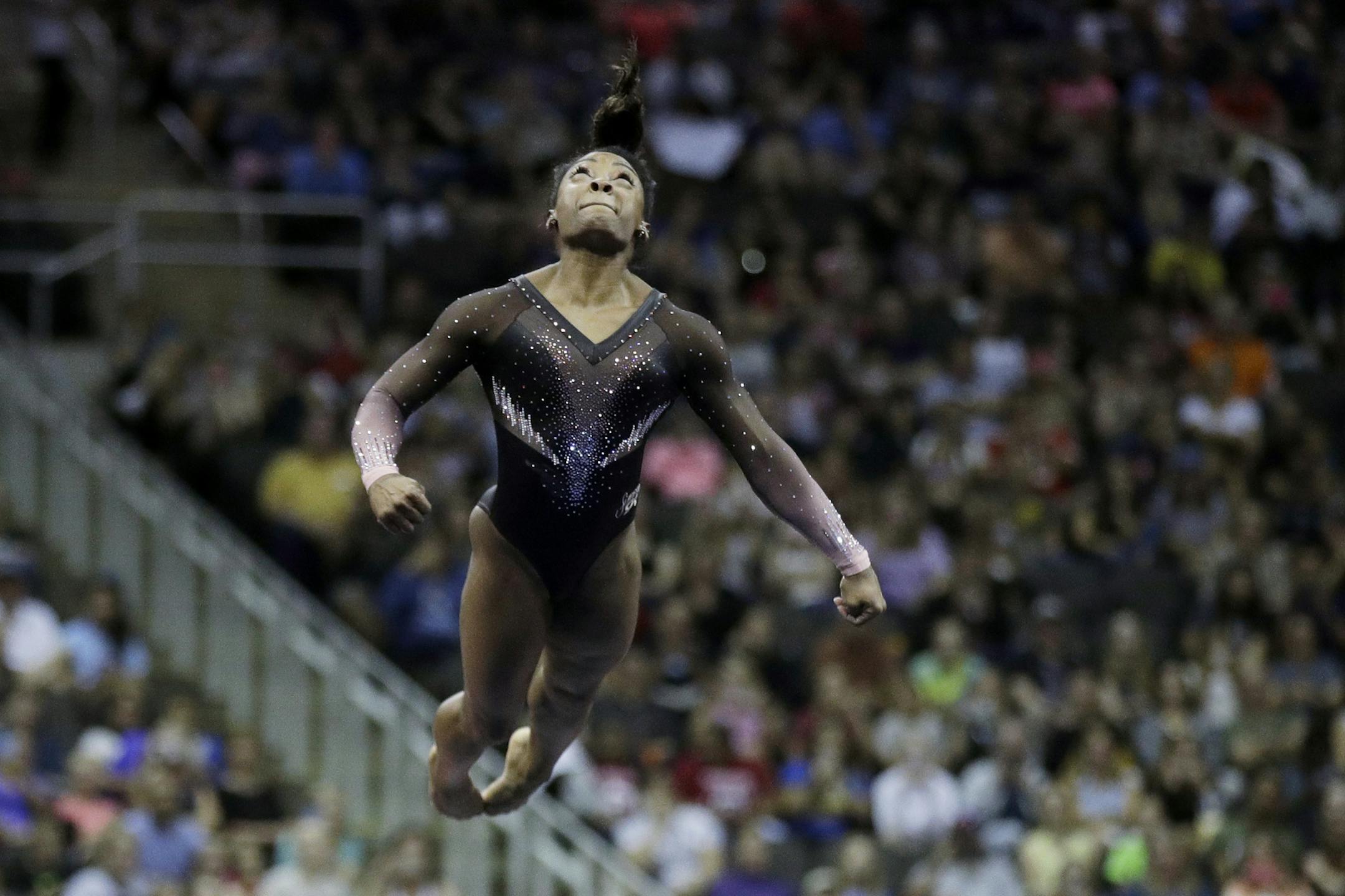 Simone Biles competes in the floor exercise during the senior women's competition at the 2019 U.S. Gymnastics Championships Sunday, Aug. 11, 2019, in Kansas City, Mo. (AP Photo/Charlie Riedel)
