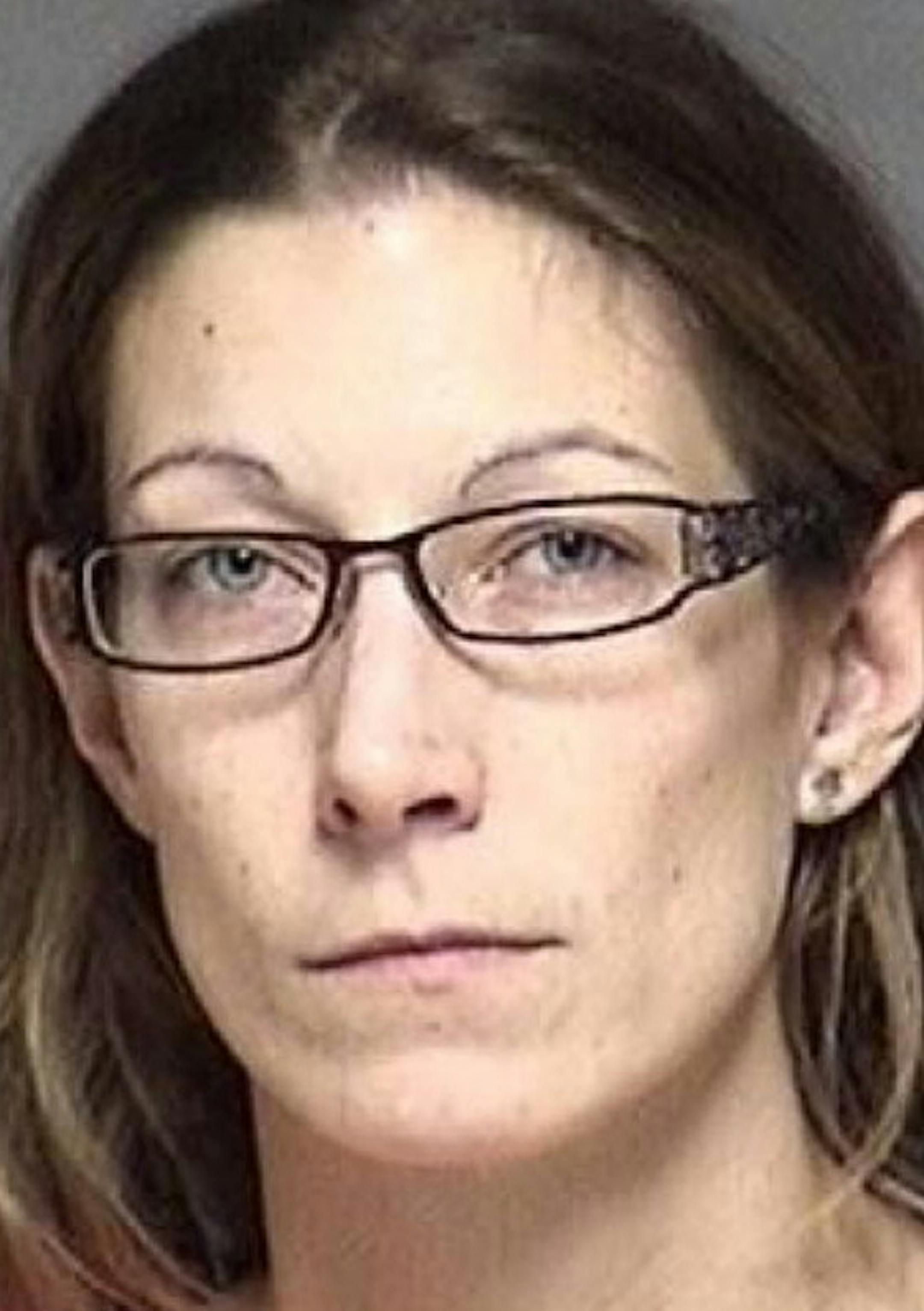 Dawn Pfister, file photo from 2014 arrest in Rochester.