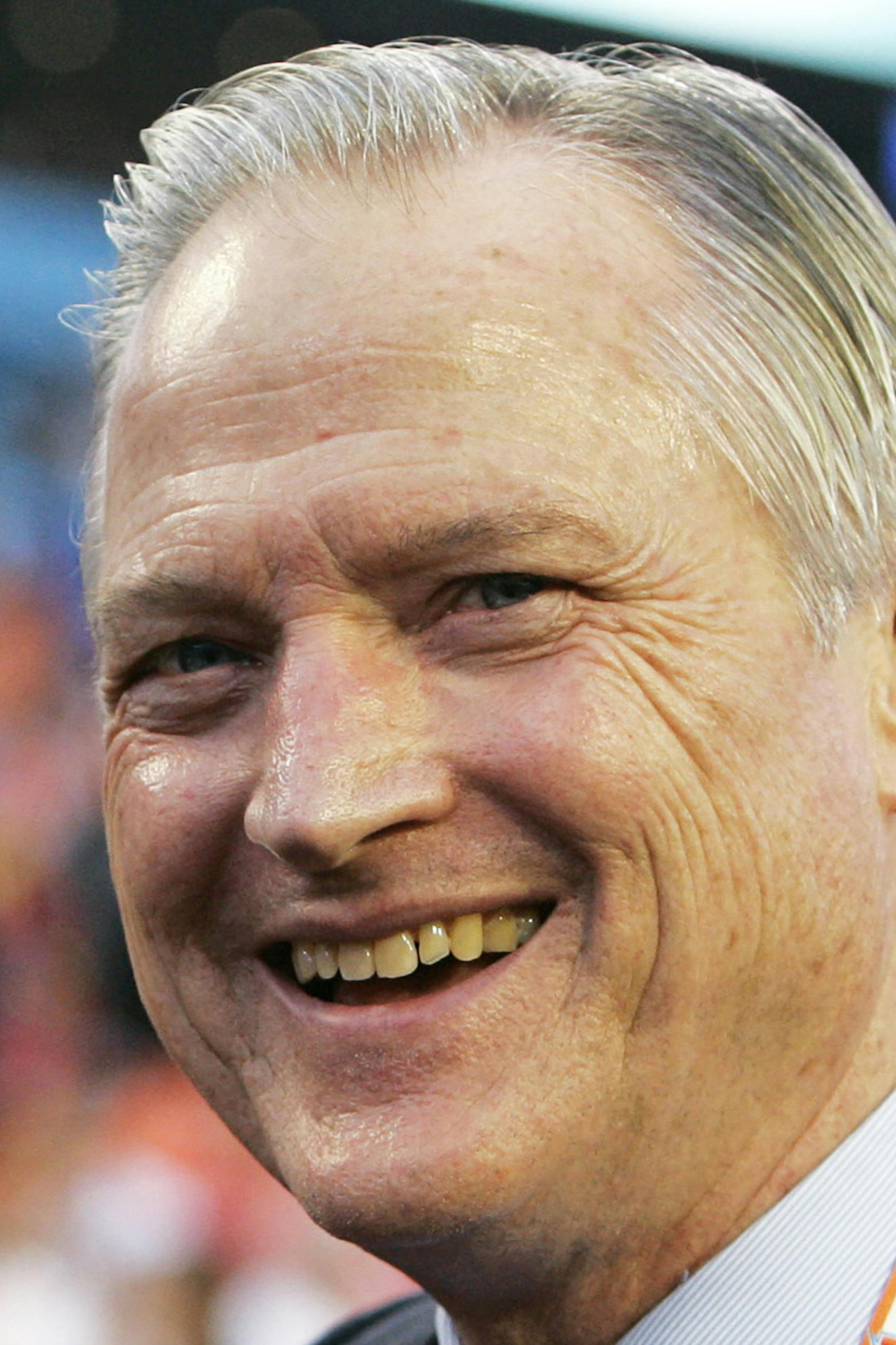 FILE - In this Feb. 4, 2007, file photo, Chicago Bears chairman Michael McCaskey is seen on the field before the Super Bowl XLI football game between the Bears and Indianapolis Colts in Miami. McCaskey, who led the Chicago Bears for nearly three decades following the death of his grandfather George Halas, died Saturday, May 16, 2020, after a lengthy battle with cancer, the team said. He was 76. (AP Photo/Jeff Roberson, File)