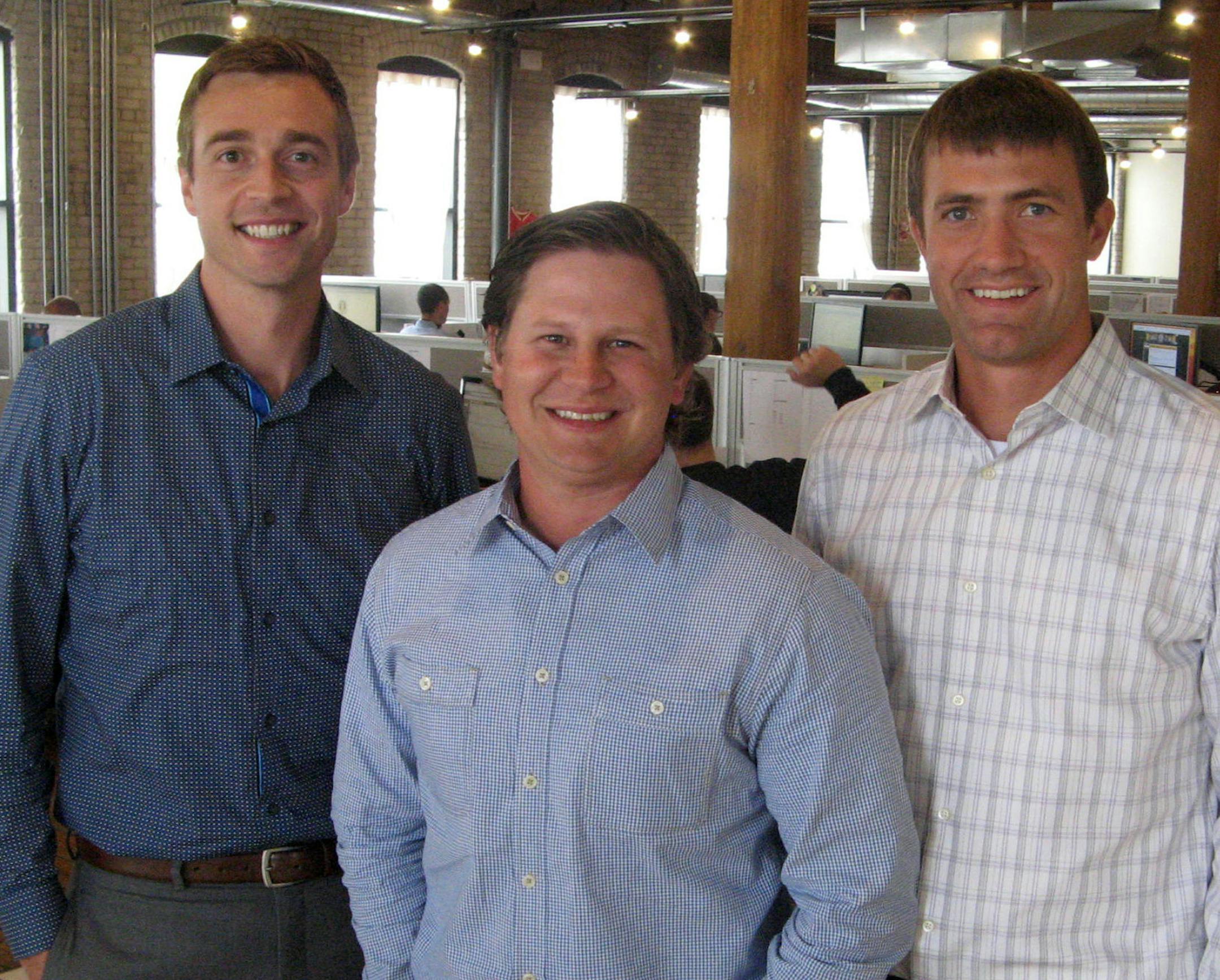 Nealst092214: Sport Ngin founders Carson Kipfer (left), Justin Kaufenberg (center),and Greg Blasko, the chief technology officer and third employee hired in 2008. The northeast Minneapolis company has grown from 40 employees to more than 200 since 2011 and just raised $25 million in expansion capital.
