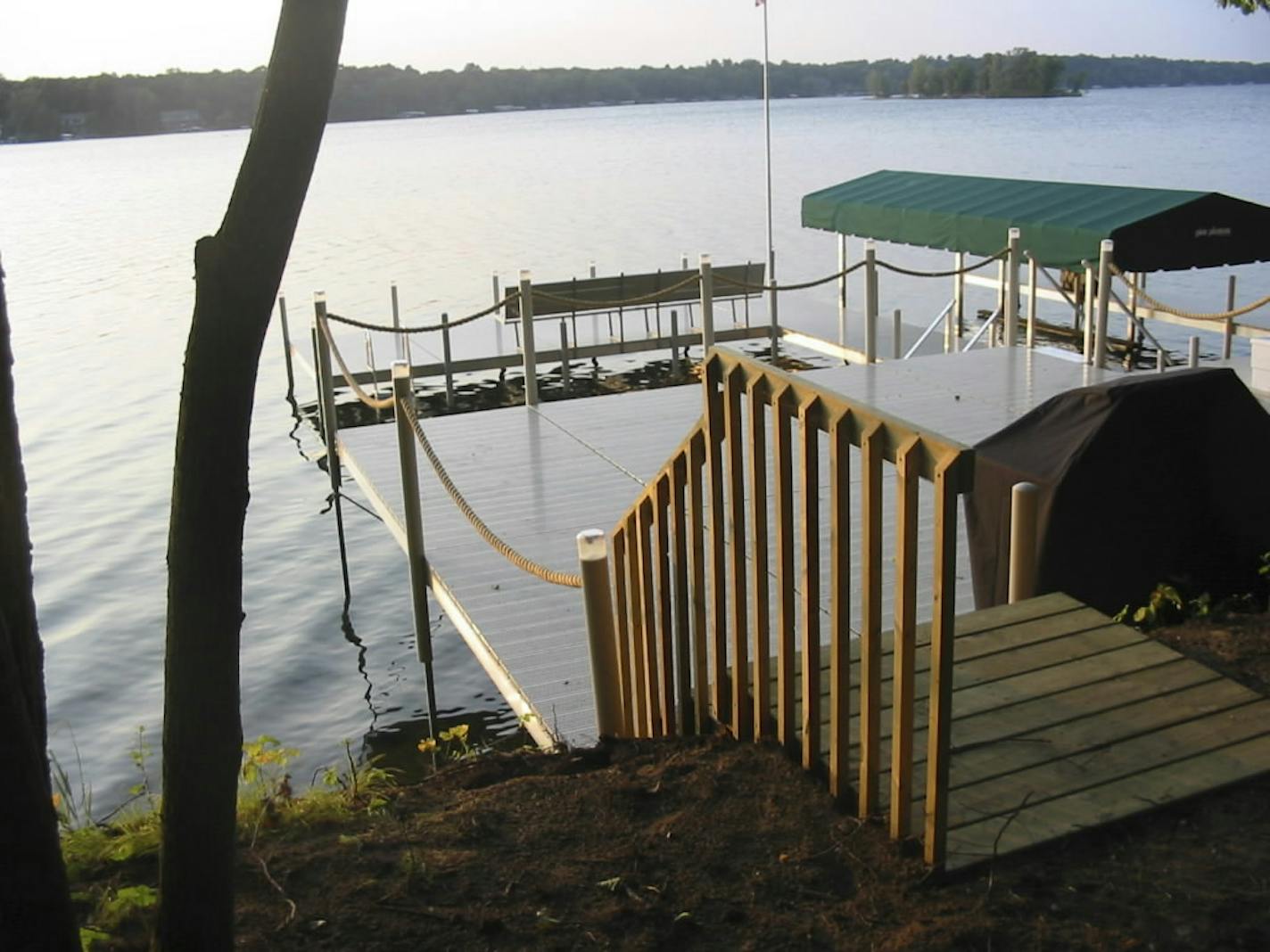 This dock on Cross Lake, seen in a file photo, appears to violate Minnesota Department of Natural Resources regulations that requires that no section of dock be more than 8 feet wide.