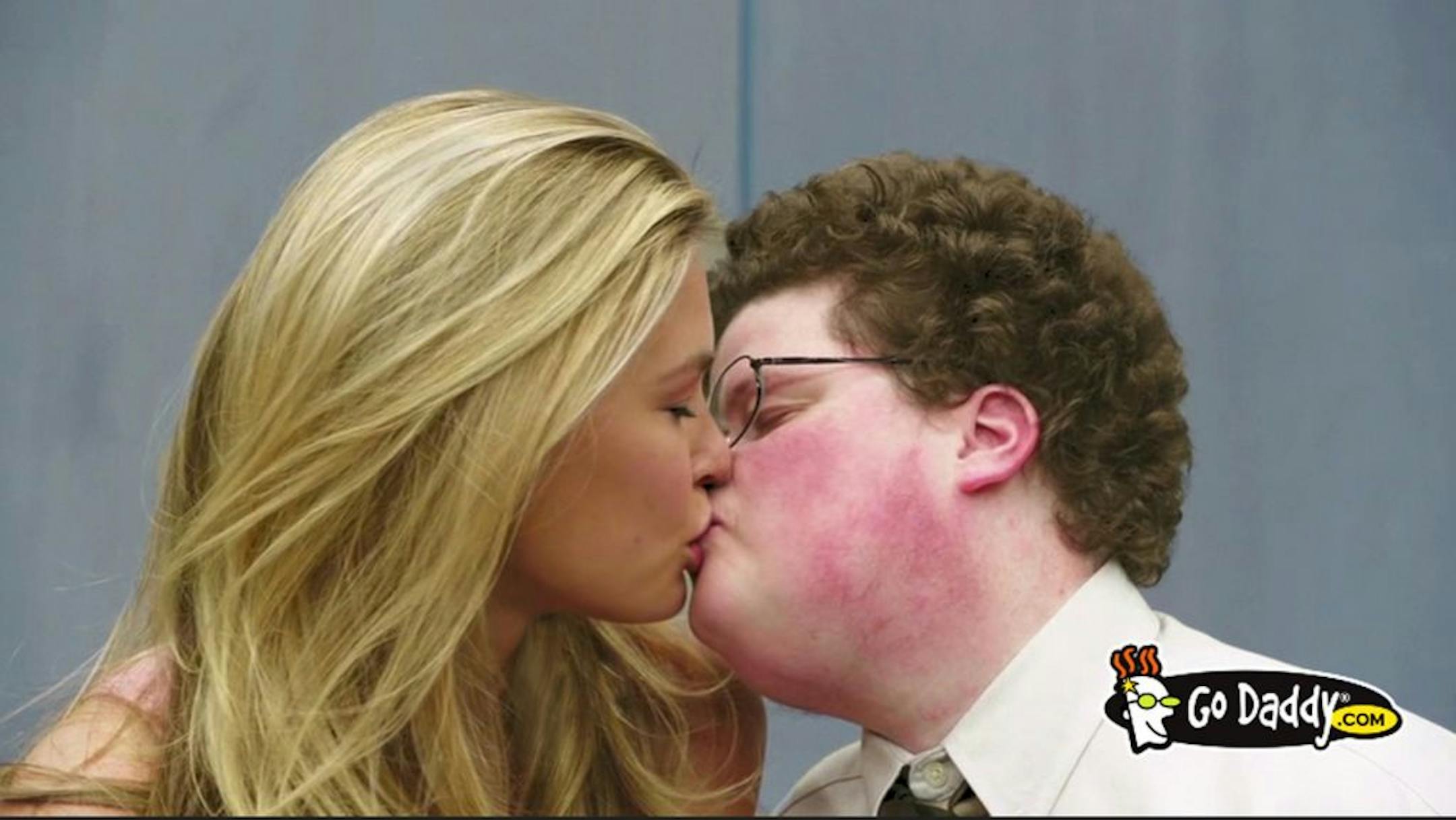 Beauty and the nerd: Go Daddy's "Perfect Match" ad featured a kiss between supermodel Bar Refaeli and character actor Jesse Heiman.