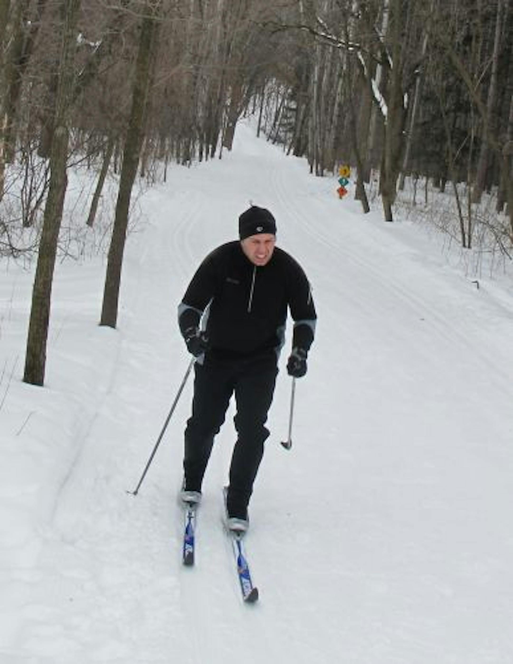 Photo by Tim Harlow
Mark Fournier , 40, of Woodbury, said he tries to squeeze in some time on the wooded trials of Lake Elmo Park Reserve three to four times a week after work, but it does get difficult because of the limited amount of daylight.