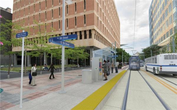 Mayor R.T. Rybak envisions streetcars running alongside buses in downtown Minneapolis.
