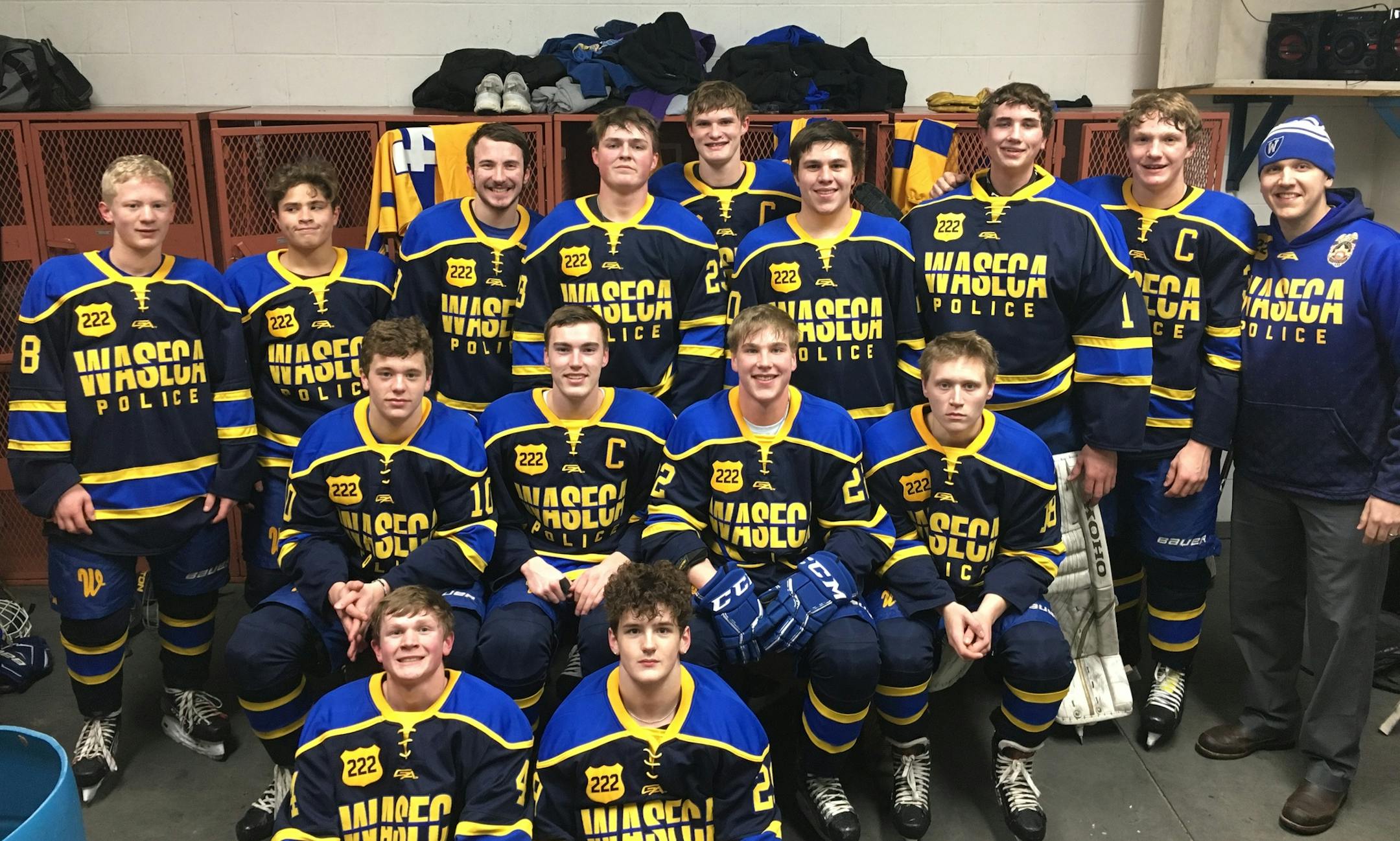 Waseca Bluejays wearing a jersery honoring wounded police officer Arik Matson.