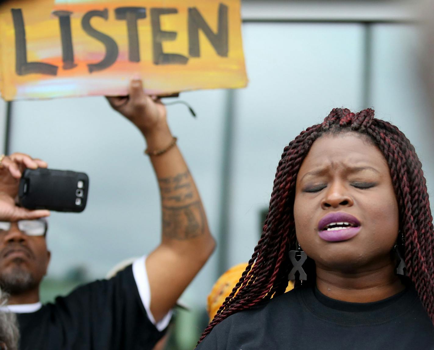 NAACP president Nekima Levy-Pounds tells those gathered that African-Americn people in Minneapolis are tired of being mistreated by the Minneapolis police during a NAACP press conference that followed U.S. Attorney Andrew Luger announcement that no federal criminal civil rights charges will be filed against the Minneapolis Police Department in the Nov. 15, 2015, shooting of Jamar Clark during a press conference Wednesday, June 1, 2016, at the FBI local headquarters in Brooklyn Center MN. Levy-Po