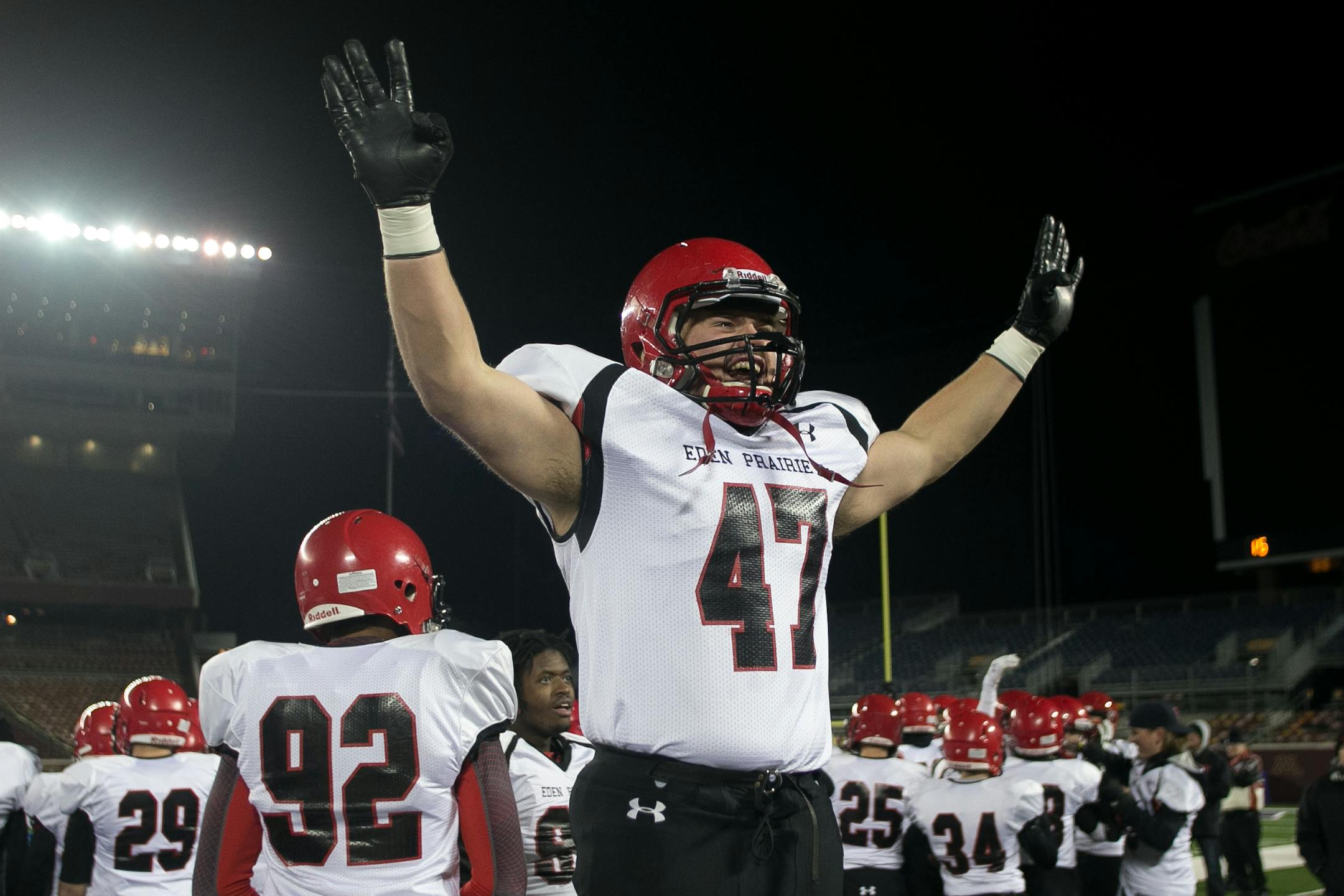 Eden Prairie defensive end Jake Halvarson put up his hands with four fingers, signifying the Eagles' fourth Class 6A title in a row to the student section at the 2014 Prep Bowl. This fall's Prep Bowl will be held Nov. 13-14, two weeks earlier than normal because of scheduling conflicts at TCF Bank Stadium.