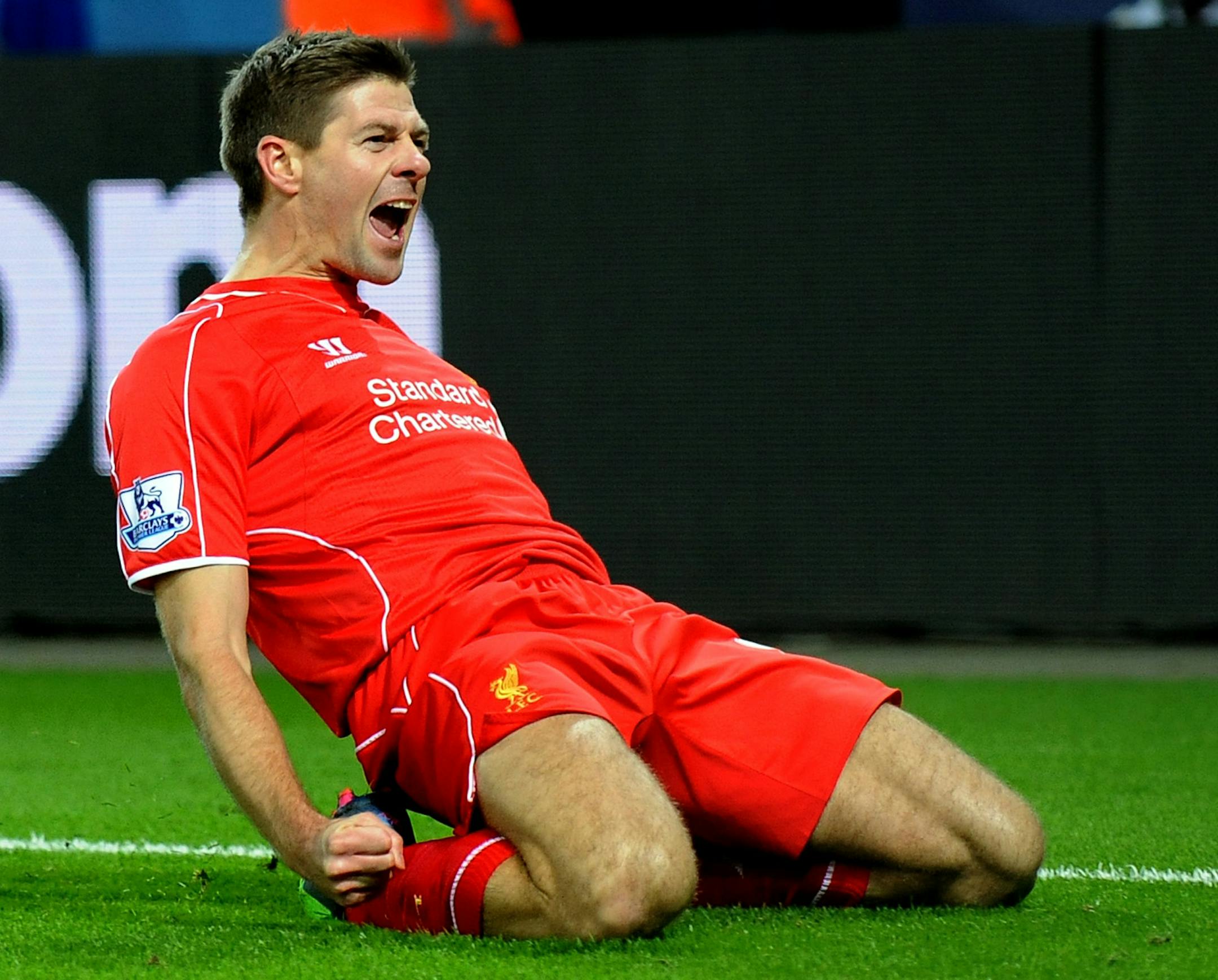 FILE - This is a Tuesday, Dec. 2, 2014 file photo of Liverpool's Steven Gerrard as he celebrates scoring against Leicester during the English Premier League soccer match between Leicester City and Liverpool at King Power Stadium, in Leicester, England. Liverpool captain Steven Gerrard is set to move to a foreign club after disclosing on Friday Jan. 2, 2015 he will leave his boyhood team after the season to seek a new football experience away from the English Premier League. The 34-year-old midfi