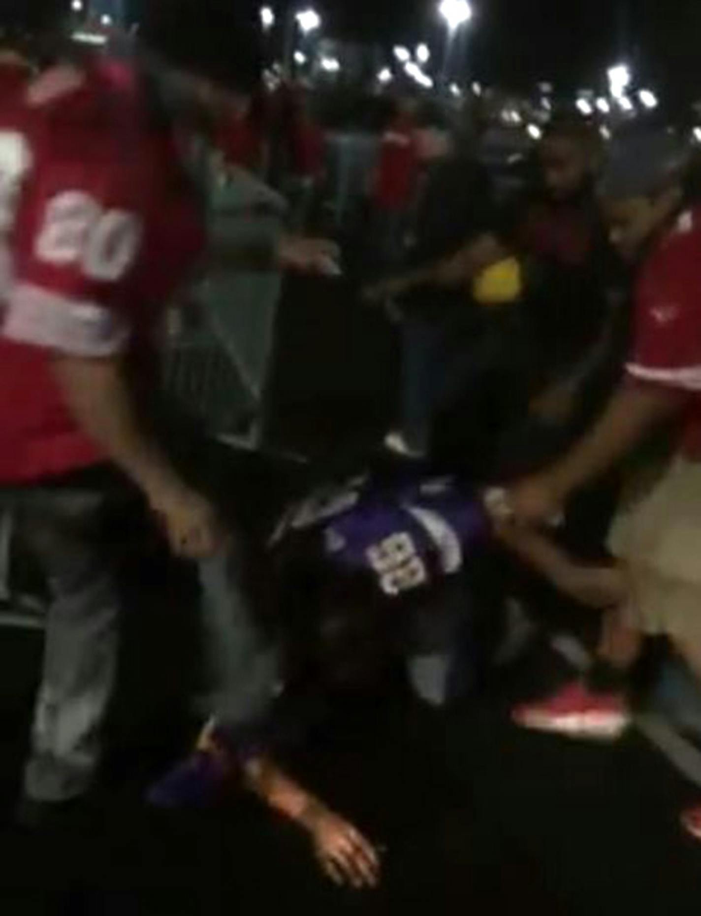 In a video posted to Facebook, a man wearing a Vikings jersey is kicked and beaten outside the San Francisco 49ers' stadium on Monday, Sept. 14, 2015