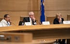 Attorney General Keith Ellison, Governor Tim Walz and Chief Justice Lorie Skjerven Gildea listened during pardon hearings in June of 2019. The board i