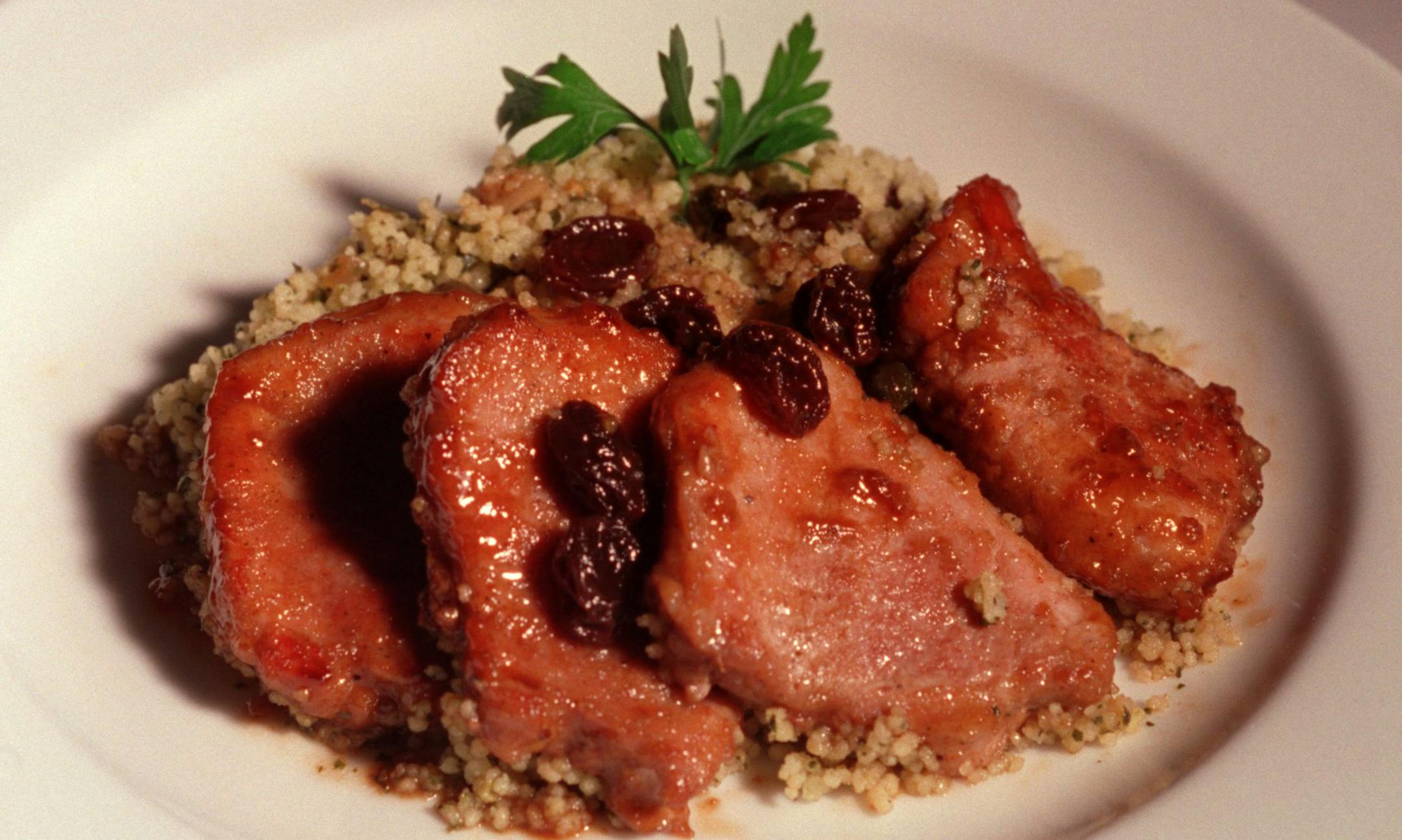 A pork tenderloin is ideal for quick meals, so try this balsamic-glazed recipe. (Ed Haun/Detroit Free Press/MCT) ORG XMIT: 1158442