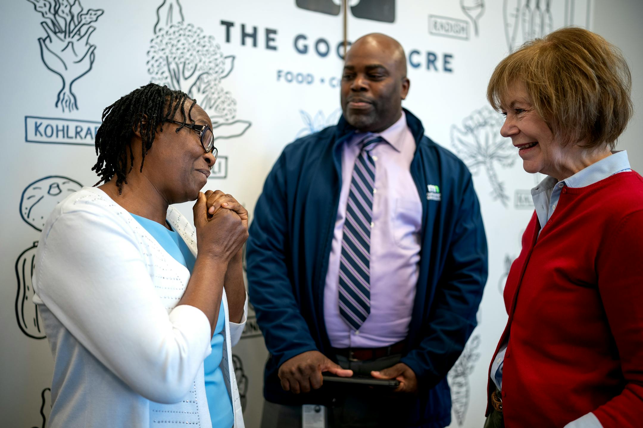 Jane Windsperger, left owner of a Vegetable market farm in Ogilvie, Minn, and Patrice Bailey assistant commissioner MN, department talked with U.S. Senator Tina Smith on  April 5, 2023 in Falcon Heights, Minn. Minnesota U.S. Senator Tina Smith met with Black,Indigenous and people- of-color farmers for a roundtable discussion at The Good Acre.