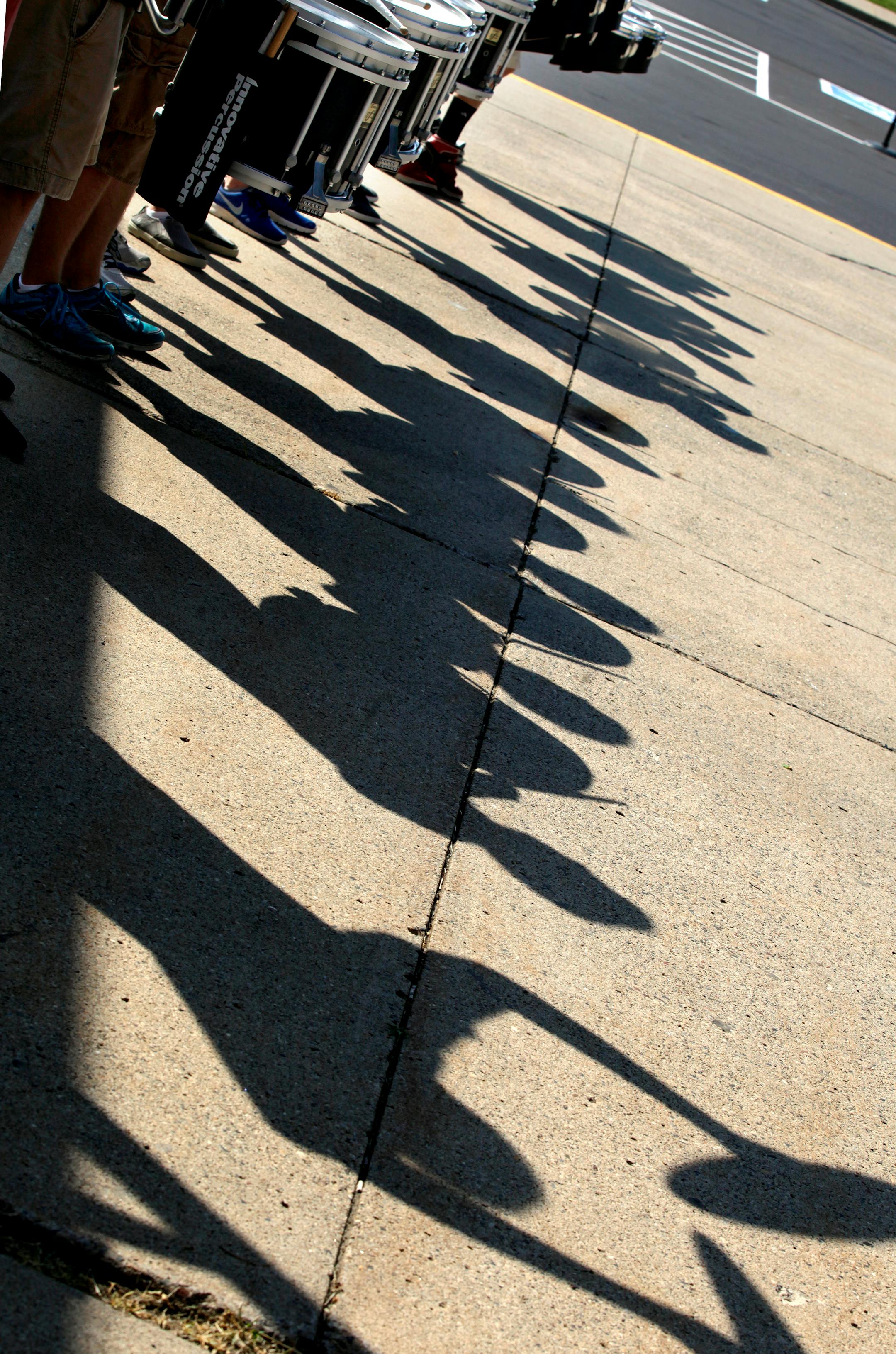 The Marching band practices for the arrival of the President of the Tournament of Roses' Scott Jenkins and his wife Cindy Jenkins at Rosemount High School on July 12, 2013.