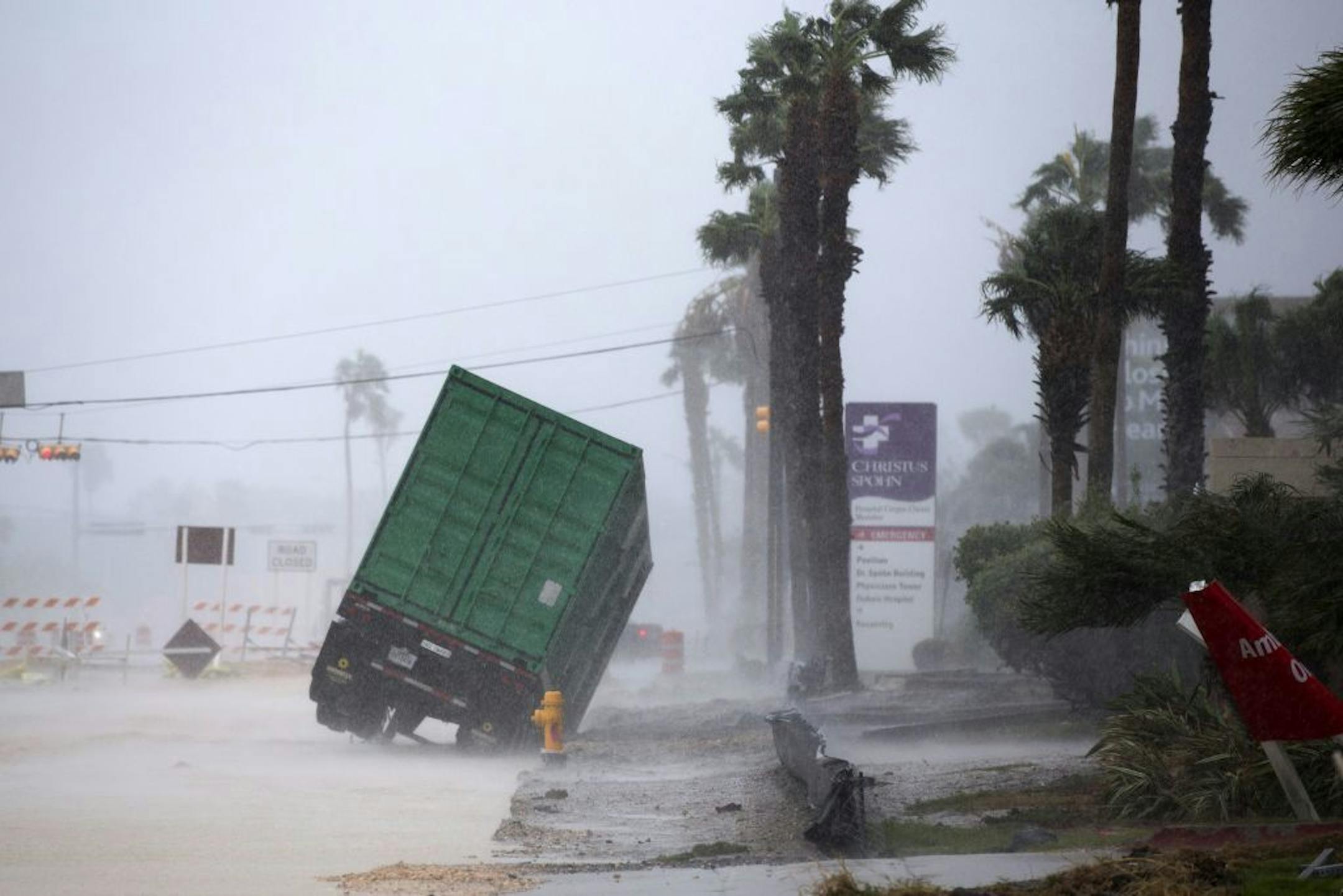 A power generator tipped in front of CHRISTUS Spohn Hospital in Corpus Christi, Texas, as Hurricane Harvey hit Friday.