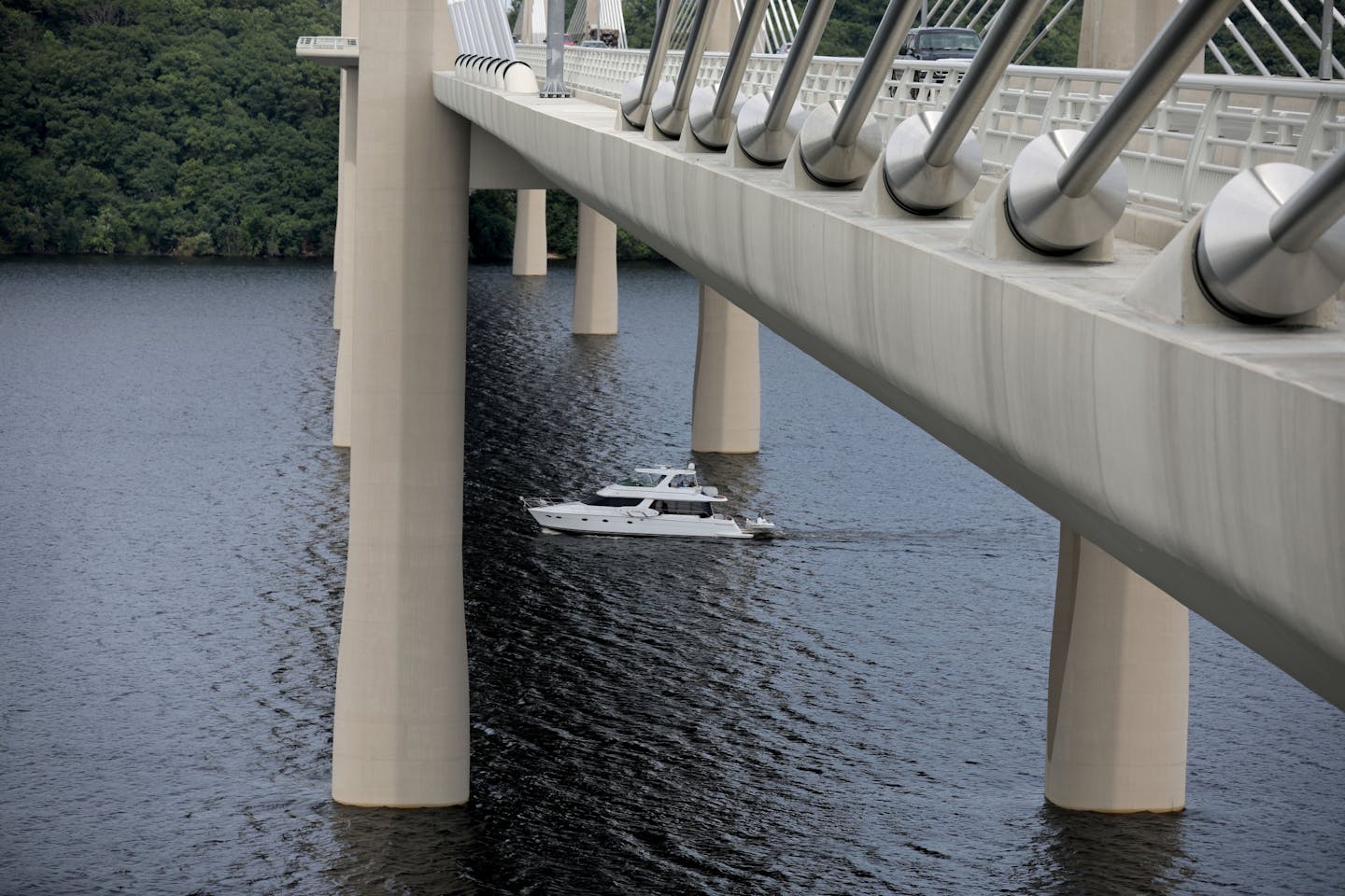 A boat cruising the St. Croix River is seen from the St. Croix River bridge in Stillwater in 2018.