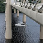 A boat cruising the St. Croix River is seen from the St. Croix River bridge in Stillwater in 2018.
