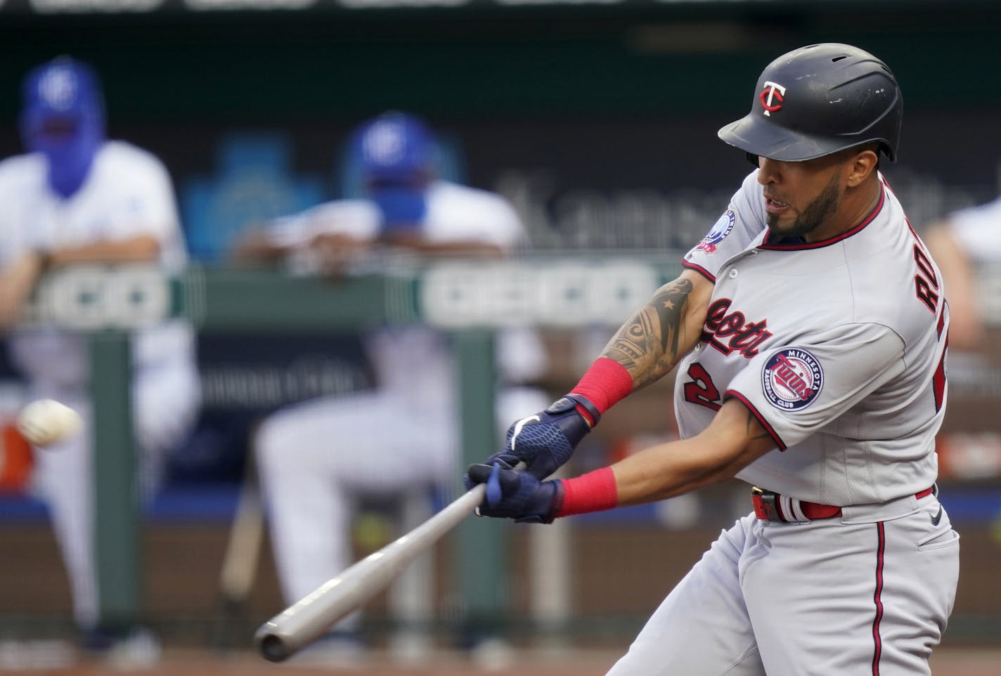 Minnesota Twins' Eddie Rosario hits a three-run home run off Kansas City Royals starting pitcher Brady Singer during the first inning of a baseball game at Kauffman Stadium in Kansas City, Mo., Saturday, Aug. 22, 2020. (AP Photo/Orlin Wagner)