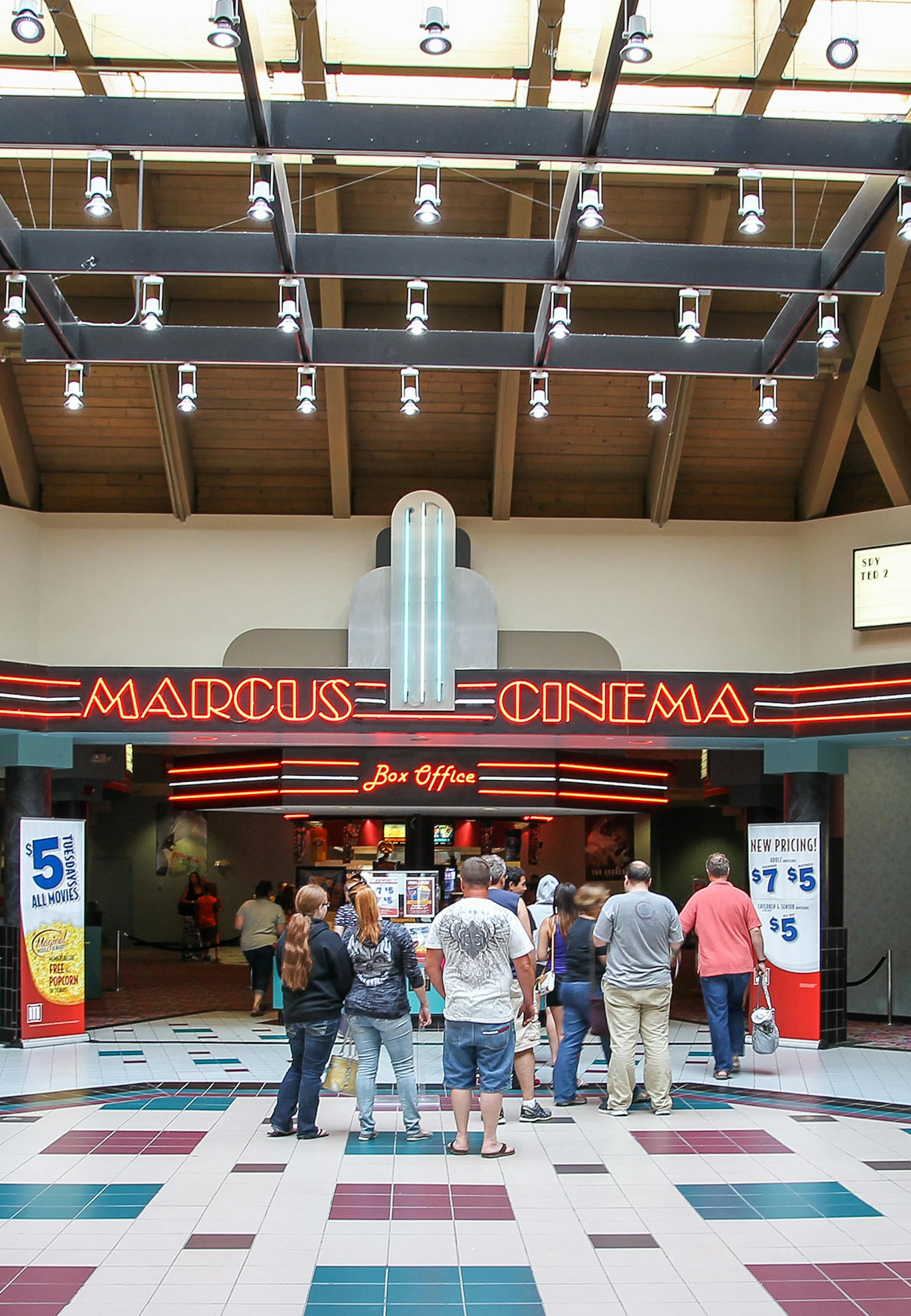 Moviegoers line up for tickets on a Tuesday night at Marcus Theatres in Shakopee, currently the city’s only theater complex. Marcus Theatres is building a new 10-screen complex about 7 miles to the east.